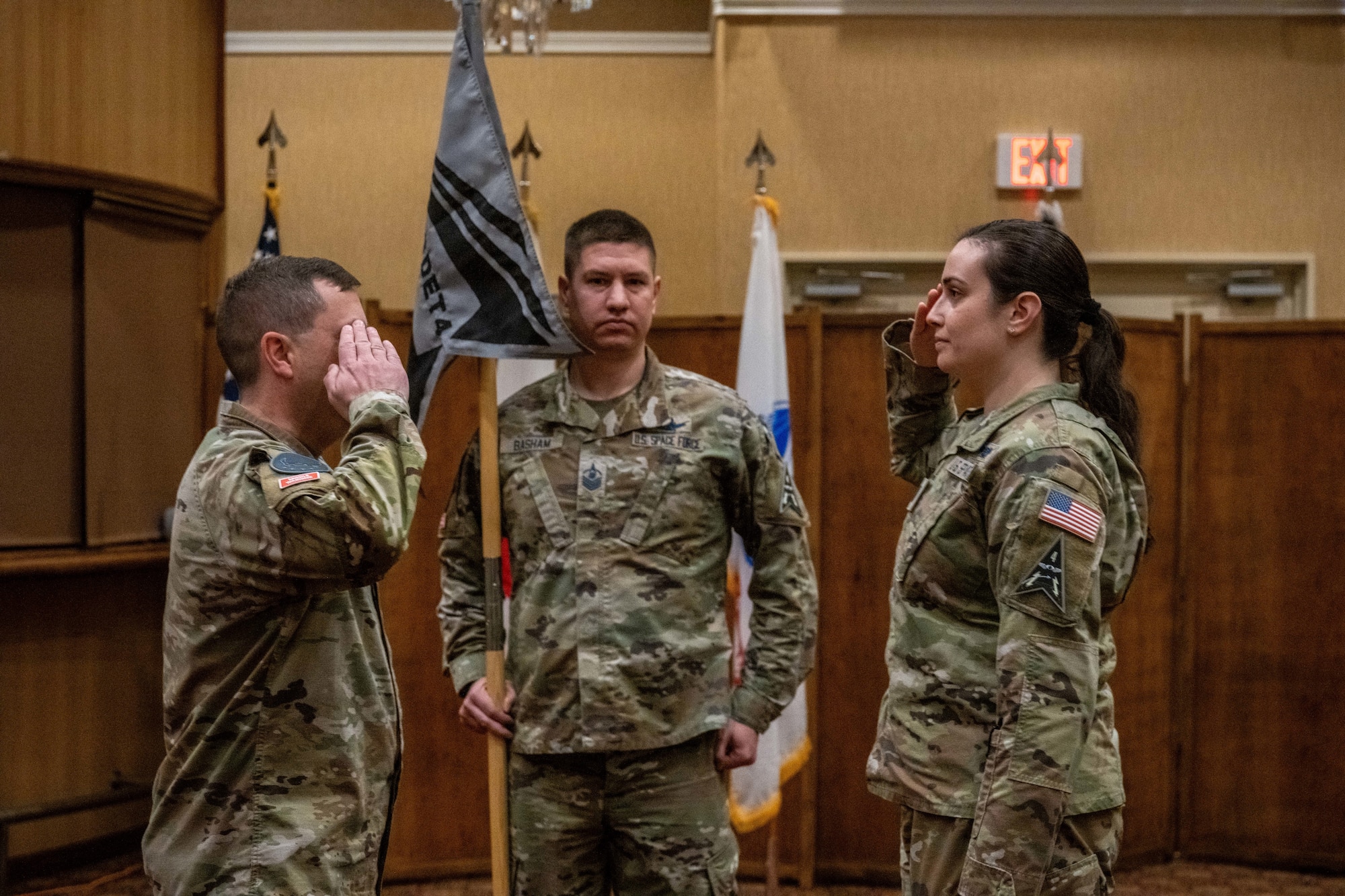 U.S. Space Force Capt. Madison Duke-Bruechert, right, 5th Space Warning Squadron Detachment 4 commander, salutes Lt. Col. Michael Provencher, left, 5th Space Warning Squadron commander, during an activation and assumption of command ceremony at Misawa Air Base, Japan, Oct. 25, 2023.