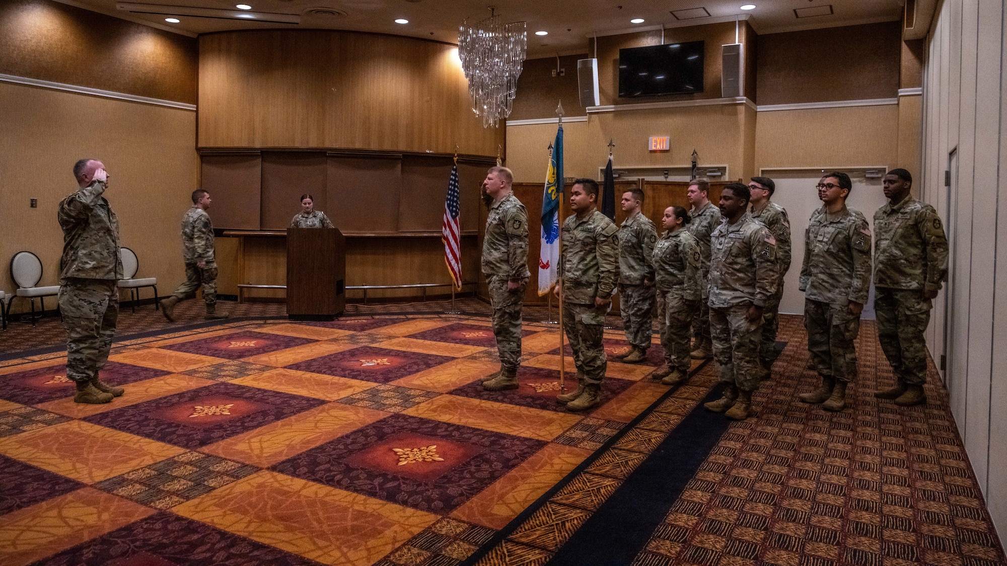 U.S. Army Capt. Gideon Bernthal, 22nd Space Company commander, relinquishes the mission command to Lt. Col. Jason McCune, 22nd Space Company 1st Space Battalion commander, during an activation and assumption of command ceremony at Misawa Air Base, Japan, Oct. 25, 2023.