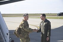 U.S. Air Force Maj. Gen. Jason Armagost, Eighth Air Force and Joint-Global Strike Operations Center commander, meets U.S. Air Force Col. Daniel Hoadley, 5th Bomb Wing commander, at Minot Air Force Base, North Dakota, Oct. 18, 2023. During his visit, Armagost spoke to base leaders and got an in-depth understanding of how Team Minot contributes to global deterrence. (U.S. Air Force photo by Senior Airman Caleb S. Kimmell)