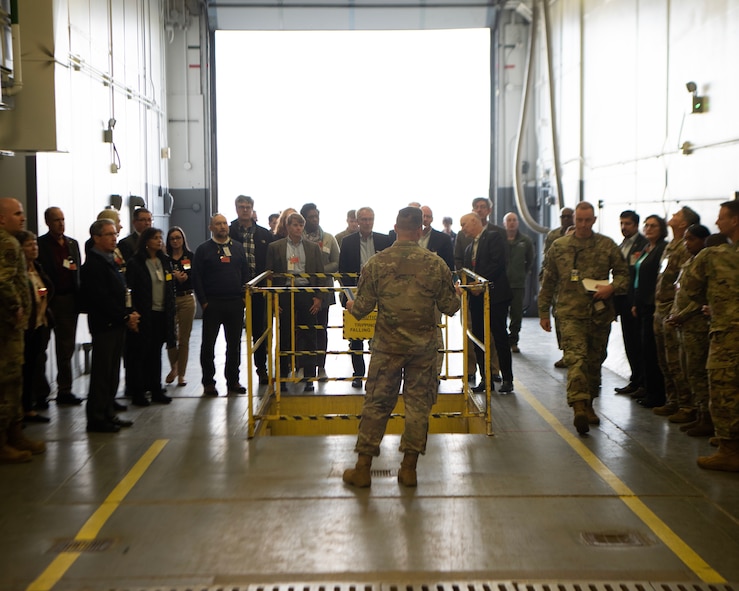 U.S. Air Force Maj. Gen. Jason Armagost, Eighth Air Force and Joint-Global Strike Operations Center commander, Chief Master Sgt. Melvina Smith, Command Chief Master Sergeant, Air Force Global Strike Command and Air Forces Strategic-Air, and directors from the National Laboratory receive a tour of the 705th Munitions Squadron weapons warehouse at Minot Air Force Base, North Dakota, Oct. 18, 2023. During this visit, Armagost, Smith, and the directors toured 5th Bomb Wing and 91st Missile Wing facilities in order to learn how their efforts line up with Team Minot’s contribution to the nuclear triad. (U.S. Air Force photo by Senior Airman Caleb S. Kimmell)