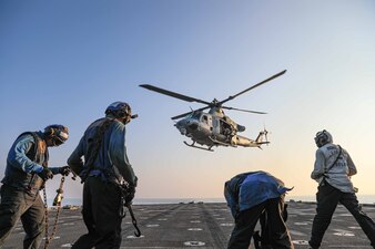 A UH-IY Venom helicopter from VMM-162 launches from USS Carter Hall (LSD 50) in U.S. 5th Fleet.