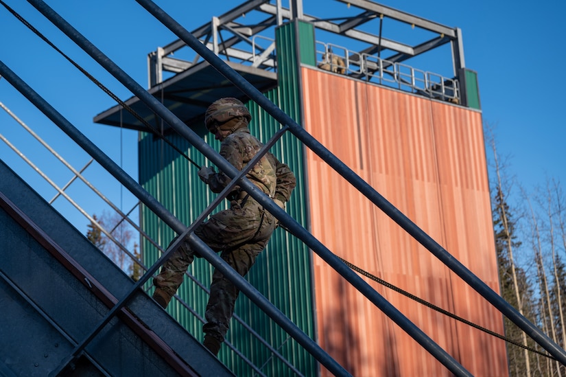 A uniformed service member participates in rappel training.