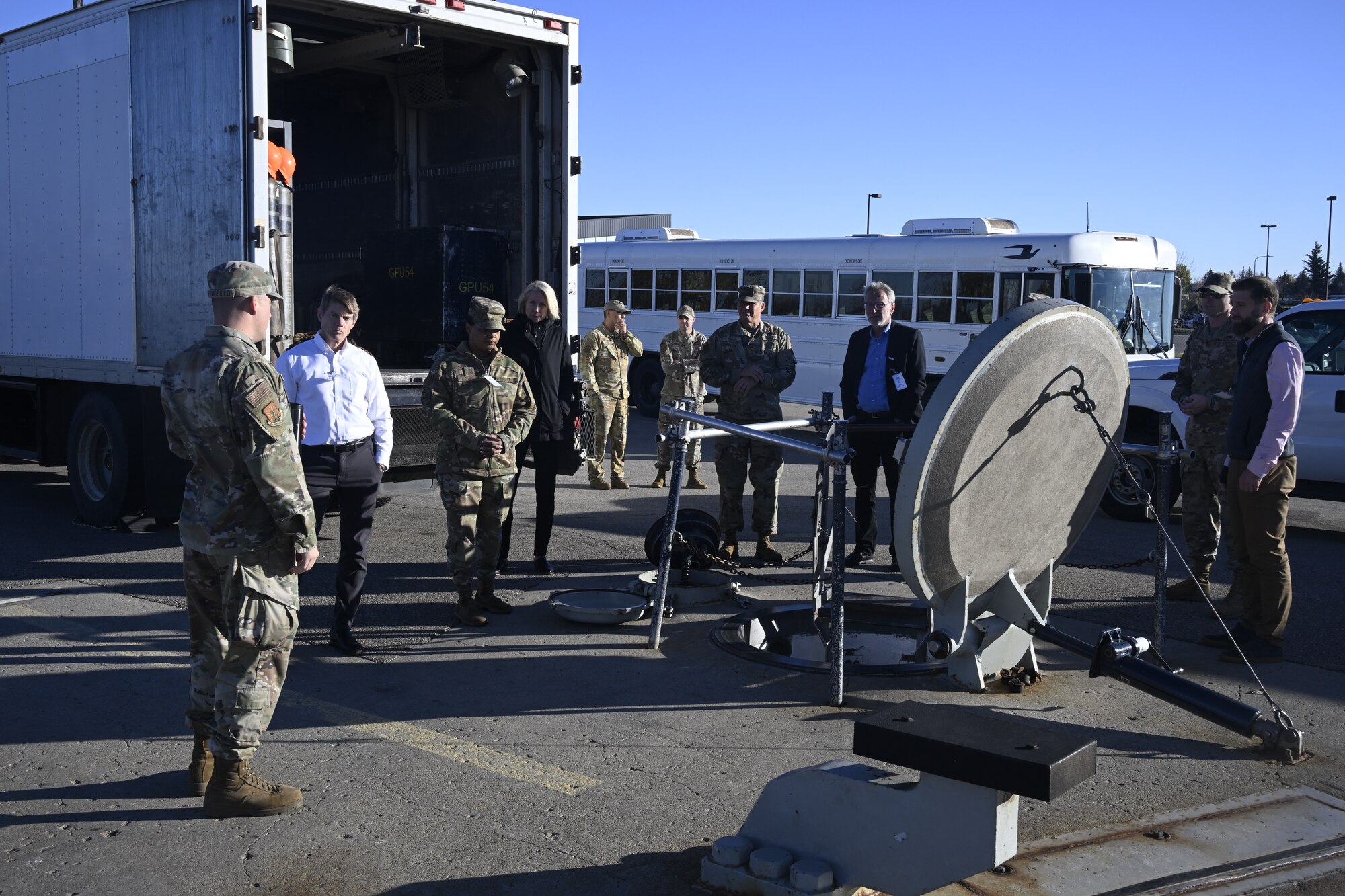 Directors from the National Laboratory receive a tour of a Minuteman III Intercontinental Ballistic Missile silo at Minot Air Force Base, North Dakota, Oct. 18, 2023. During the visit, the directors toured 5th Bomb Wing and 91st Missile Wing facilities in order to learn how their efforts directly effect Team Minot’s contribution to the nuclear triad. (U.S. Air Force photo by Senior Airman Caleb S. Kimmell)