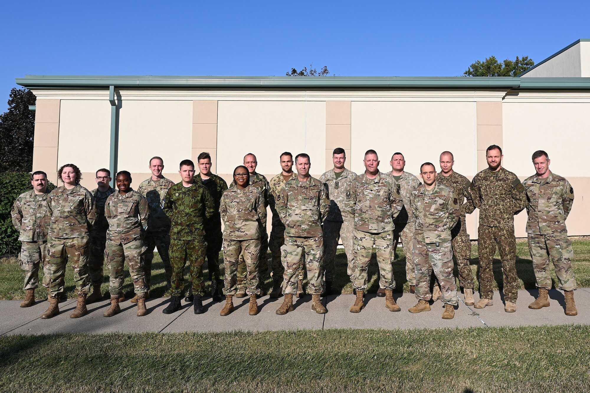 Airmen assigned to the 123rd Air Control Squadron in Blue Ash pose alongside service members from four NATO nations: Estonia, Lithuania, Latvia and Hungary. The training, which included air battle management, ground control intercept, large-force employment and air-to-air combat beyond visual range, began September 11 and concluded September 22, 2023. (U.S. Air National Guard photo by Shane Hughes)