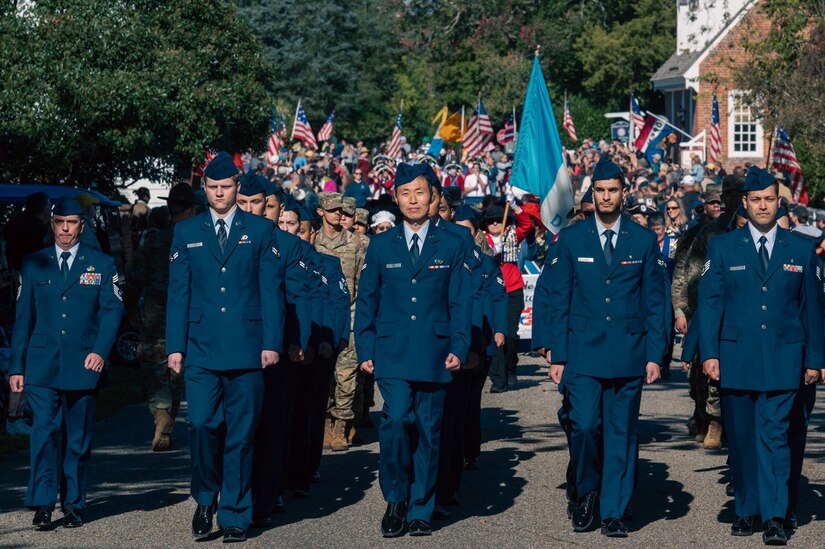 U.S. service members march in formation during the Yorktown Day Parade, Oct. 19, 2023, Yorktown, Virginia. The parade is held annually to commemorate the end of the Battle of Yorktown. (U.S. Air Force photo by Airman 1st Class Ian Sullens)