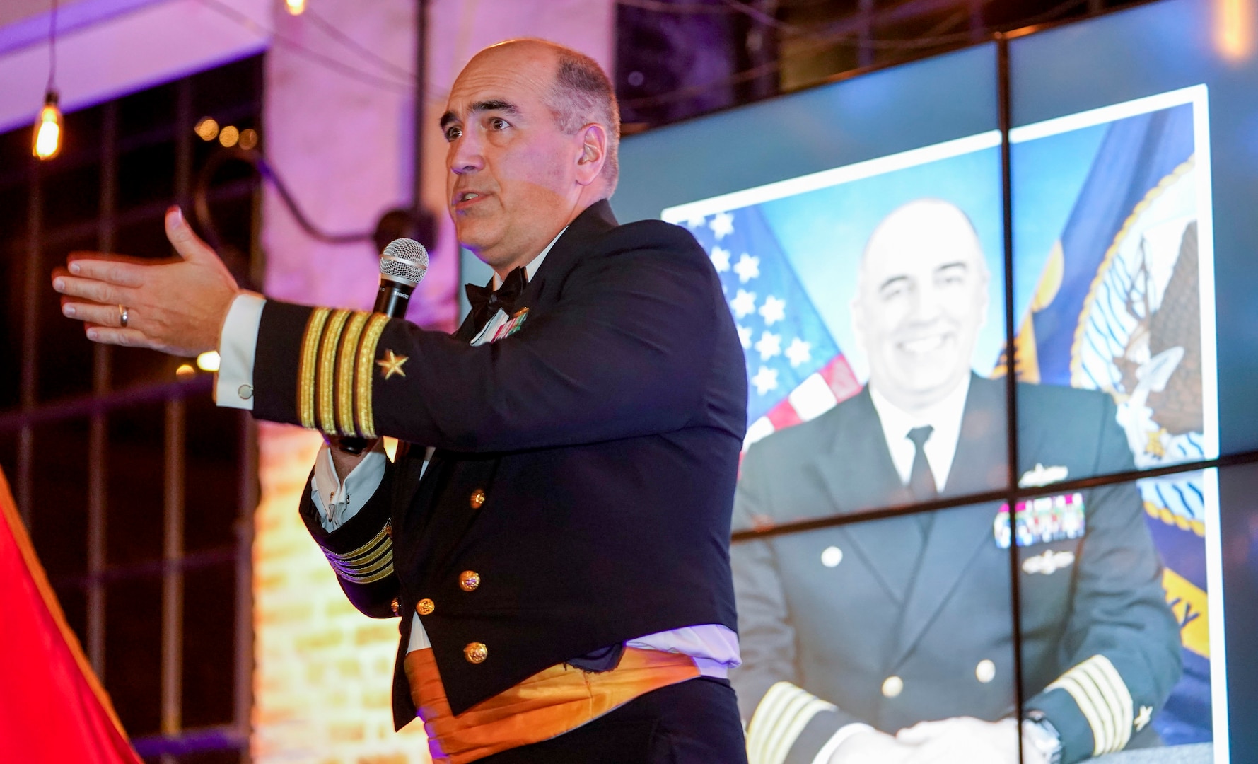 IMAGE: Naval Surface Warfare Center Dahlgren Division (NSWCDD) Commanding Officer Capt. Philip Mlynarski speaks during the NSWCDD Dahlgren Downtown Forging Community Partnerships event held at the Silk Mill in Fredericksburg Oct. 20.