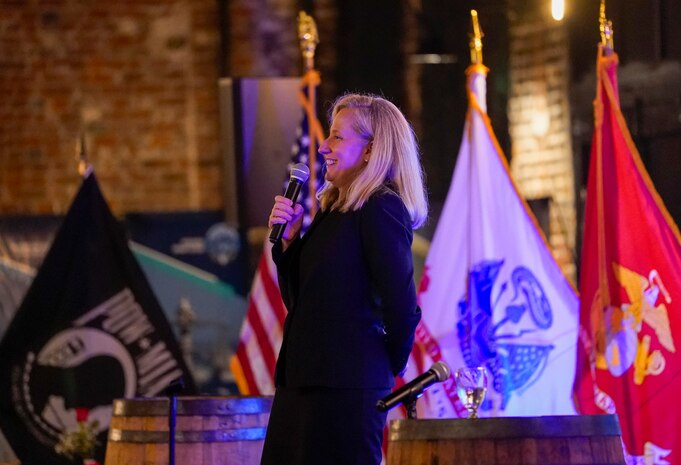 IMAGE: Rep. Abigail Spanberger speaks during the Naval Surface Warfare Center Dahlgren Division Dahlgren Downtown Forging Community Partnerships event held at the Silk Mill in Fredericksburg Oct. 20. Spanberger, who represents Virginia’s 7th District, served as the keynote speaker for the second annual event.