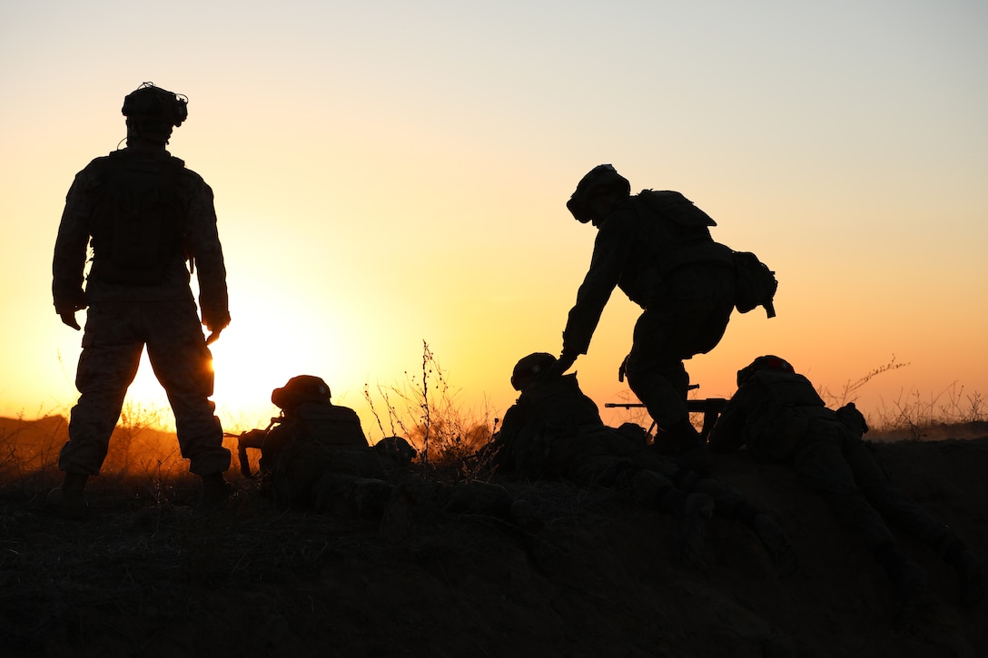 U.S. Marines with 2nd Battalion, 4th Marine Regiment, 1st Marine Division, and Singapore Guardsmen with the 7th Singapore Infantry Brigade, conduct a live fire range as part of Exercise Valiant Mark 2023 at Camp Pendleton, CA, Oct. 13, 2023. Valiant Mark 2023 is an annual, bilateral training exercise conducted between the Singapore Armed Forces and I Marine Expeditionary Force, designed to enhance interoperability, improve combined arms and amphibious warfighting skills, and strengthen military-to-military relationships. (U.S. Marine Corps photo by Sgt. Quince D. Bisard)