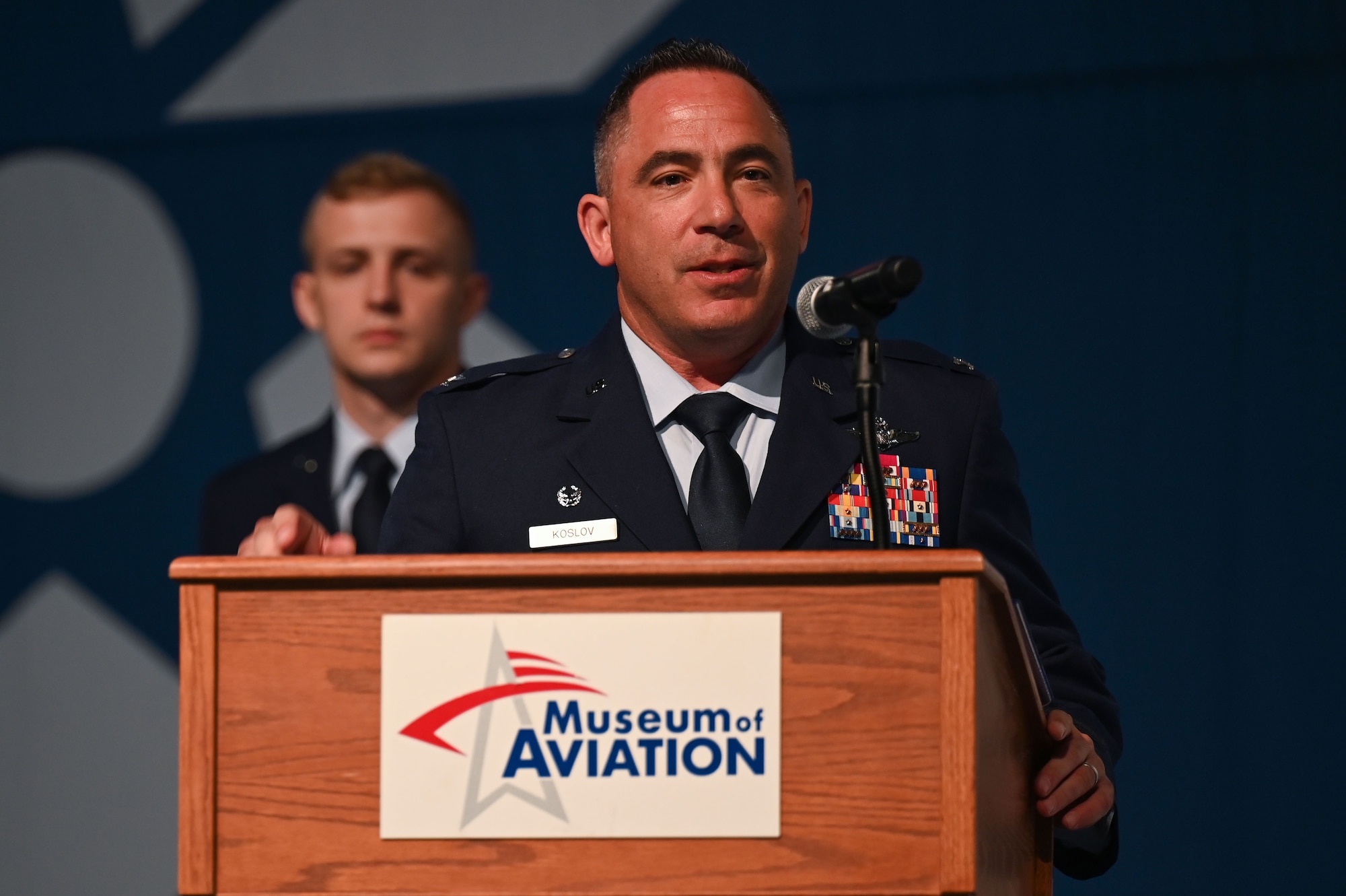 U.S. Air Force Col. Josh Koslov, 350th Spectrum Warfare Wing commander, speaks during the activation ceremony of the 350th SWW’s first detachments Robins Air Force Base, GA, Oct. 25, 2023. The existence of the wing and the establishment of new units signify the Department of Defense’s commitment to achieving EMS supremacy. (U.S. Air Force photo by Staff Sgt. Ericka A. Woolever)