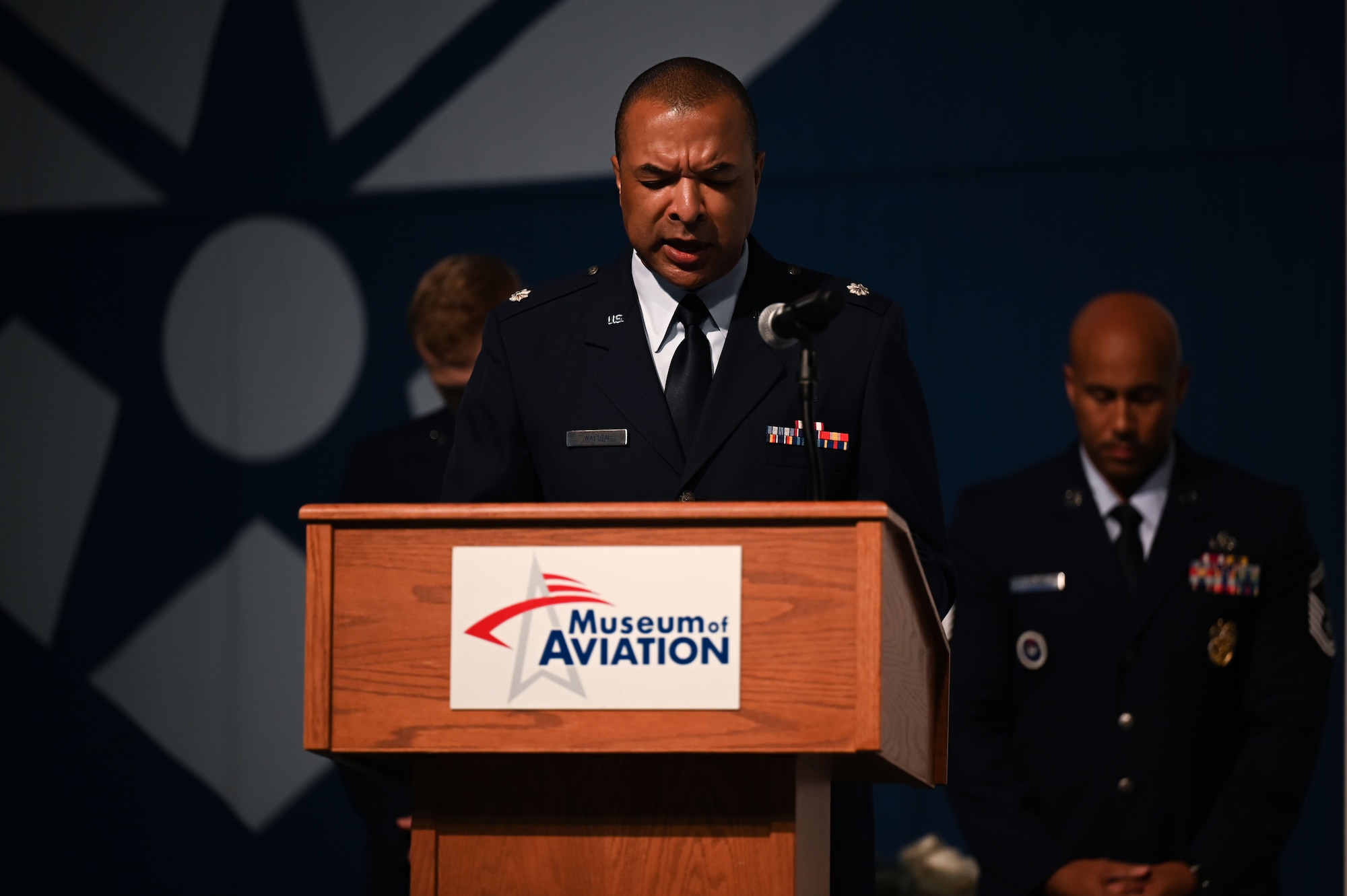 U.S. Air Force Lt. Col. Christopher Reeder, senior installation chaplain, gives an opening prayer for the activation ceremony for the 350th Spectrum Warfare Wing, Detachment 1 and the 87th Electronic Warfare Squadron, Detachment 1 at Robins Air Force Base, GA, Oct. 25, 2023. The detachments are part of an activation process for the future 950th Spectrum Warfare Group. (U.S. Air Force photo by Staff Sgt. Ericka A. Woolever)