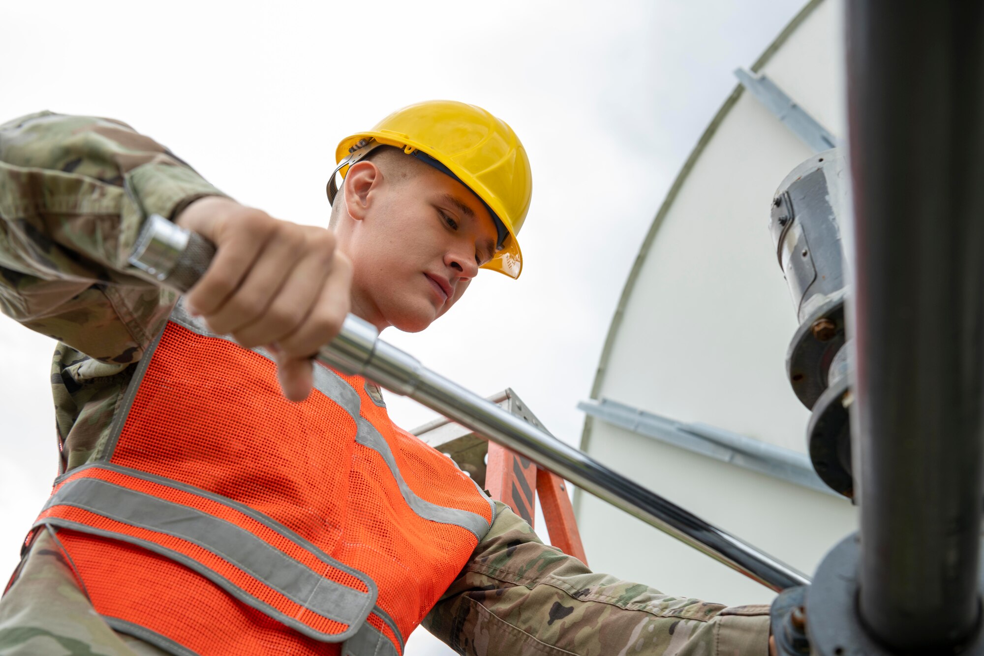 U.S. Space Force Sgt. Evan Knight, 5th Space Warning Squadron (SWS) Joint Tactical Ground Station crew chief, tightens a bolt at Misawa Air Base, Japan, Oct. 5, 2023.