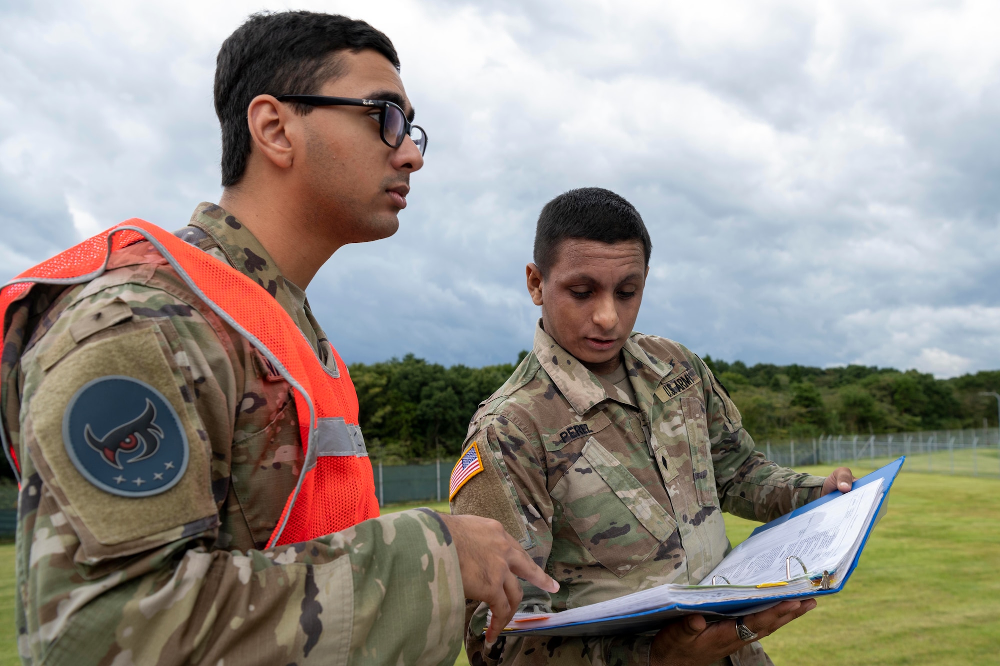 U.S. Space Force Specialist 4 Joshua Henriques, 5th Space Warning Squadron (SWS) Joint Tactical Ground Station operator, and U.S. Army Specialist Jario Perez Martinez, 22nd Space Company, perform satellite checks at Misawa Air Base, Japan, Oct. 5, 2023.