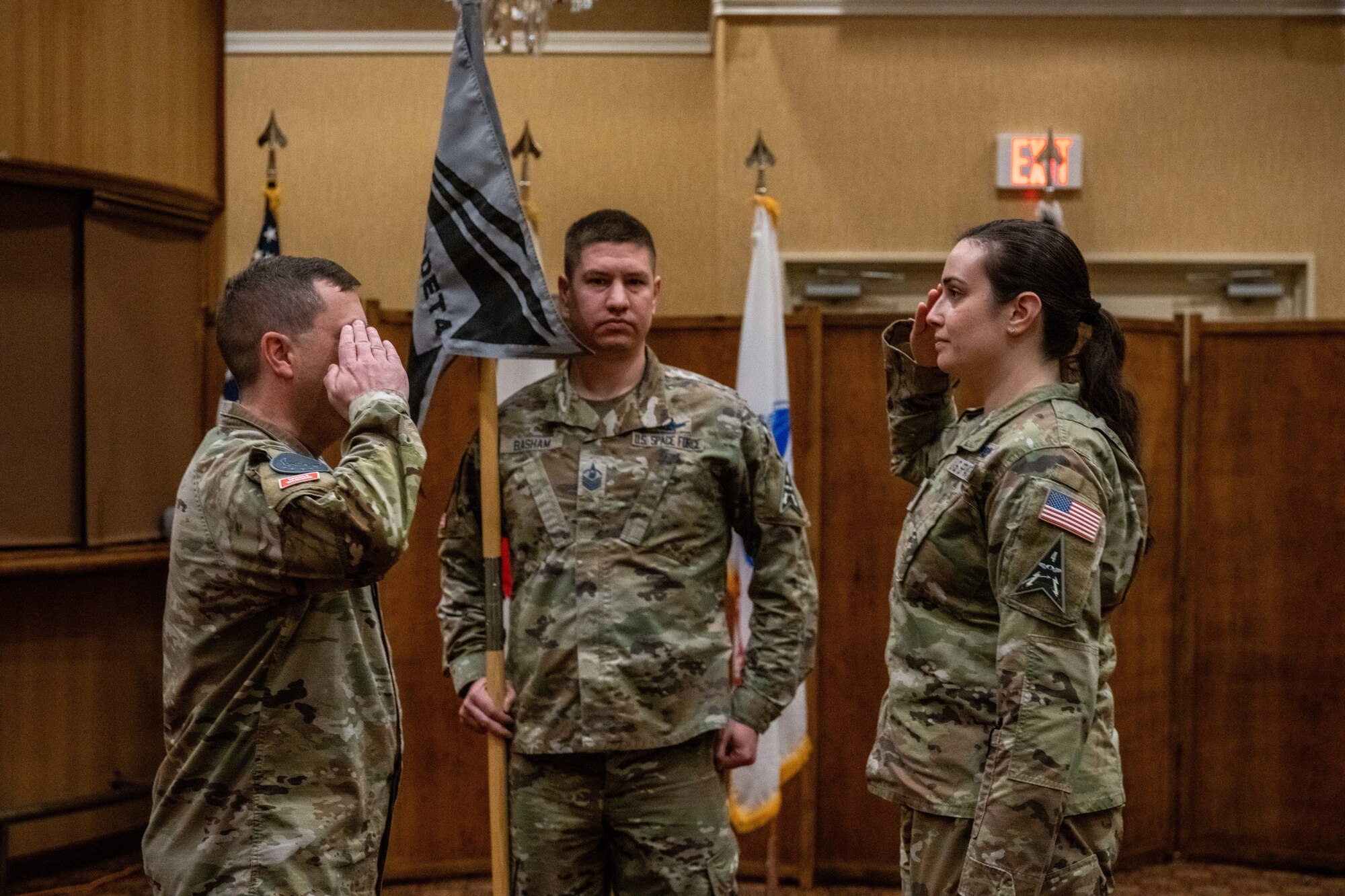 U.S. Space Force Capt. Madison Duke-Bruechert, right, 5th Space Warning Squadron Detachment 4 commander, salutes Lt. Col. Michael Provencher, left, 5th Space Warning Squadron commander, during an activation and assumption of command ceremony at Misawa Air Base, Japan, Oct. 25, 2023.