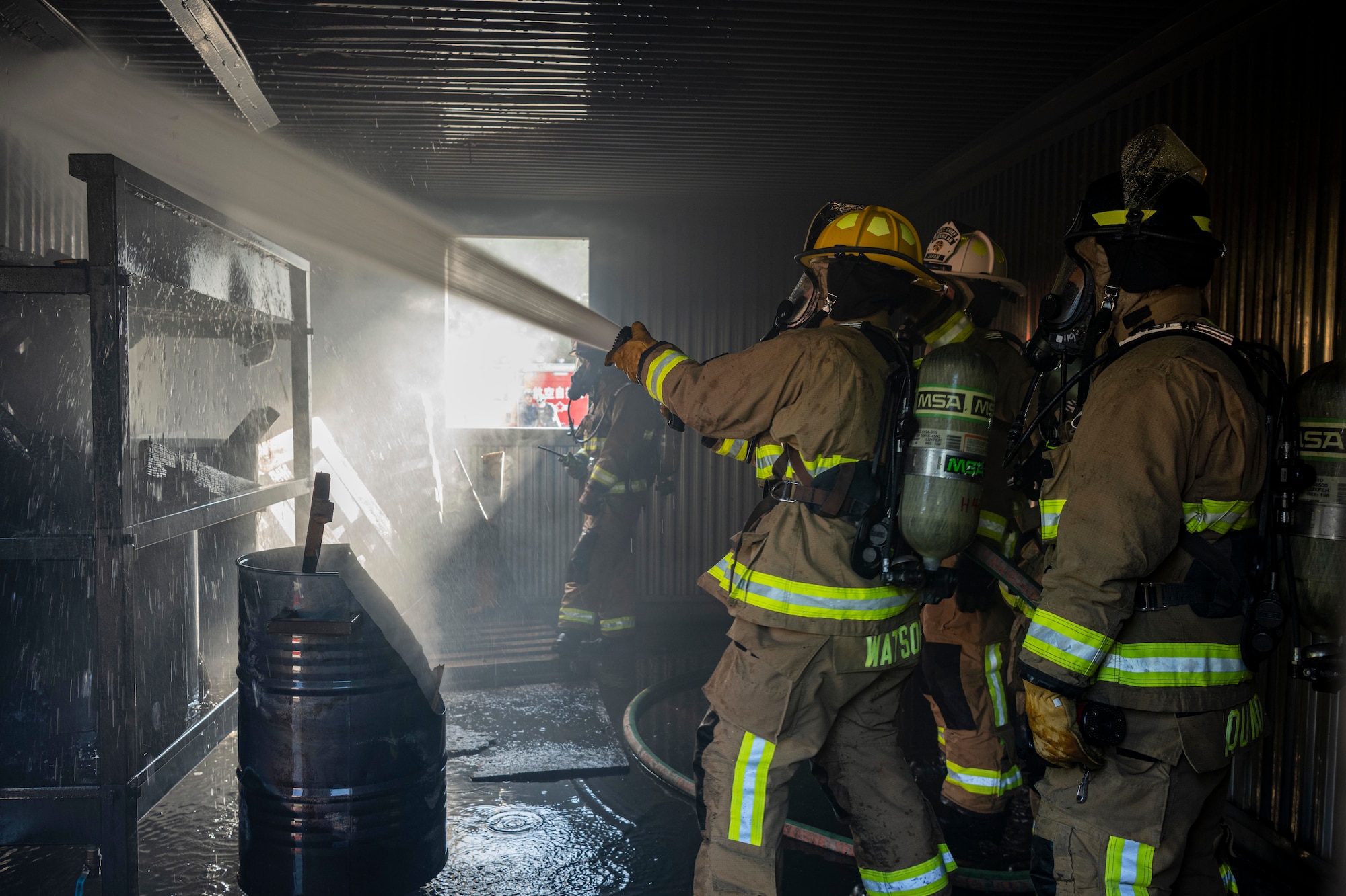 Firefighter put out a fire.