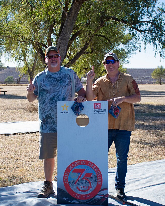 HASTY, Colo., -- Gary and Brent Harbert placed first in the cornhole tournament, Oct. 21, 2023. The tournament was one of several events organized by USACE John Martin staff in celebration of the 75th anniversary of John Martin Dam and Reservoir.