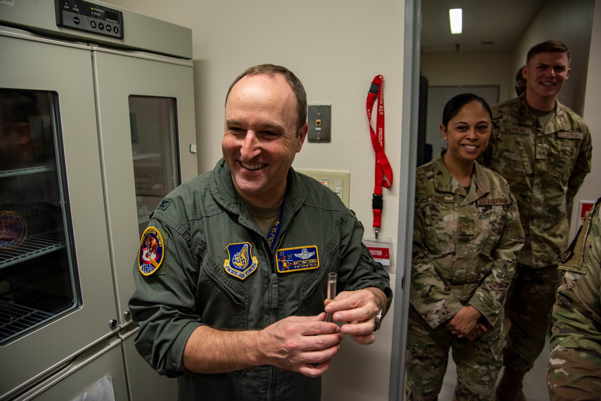 U.S. Air Force Col. Matthew Kenkel, 35th Fighter Wing deputy commander, holds a test tube during a Wild Weasel Walk-Through at Misawa Air Base, Japan, Oct. 19, 2023.