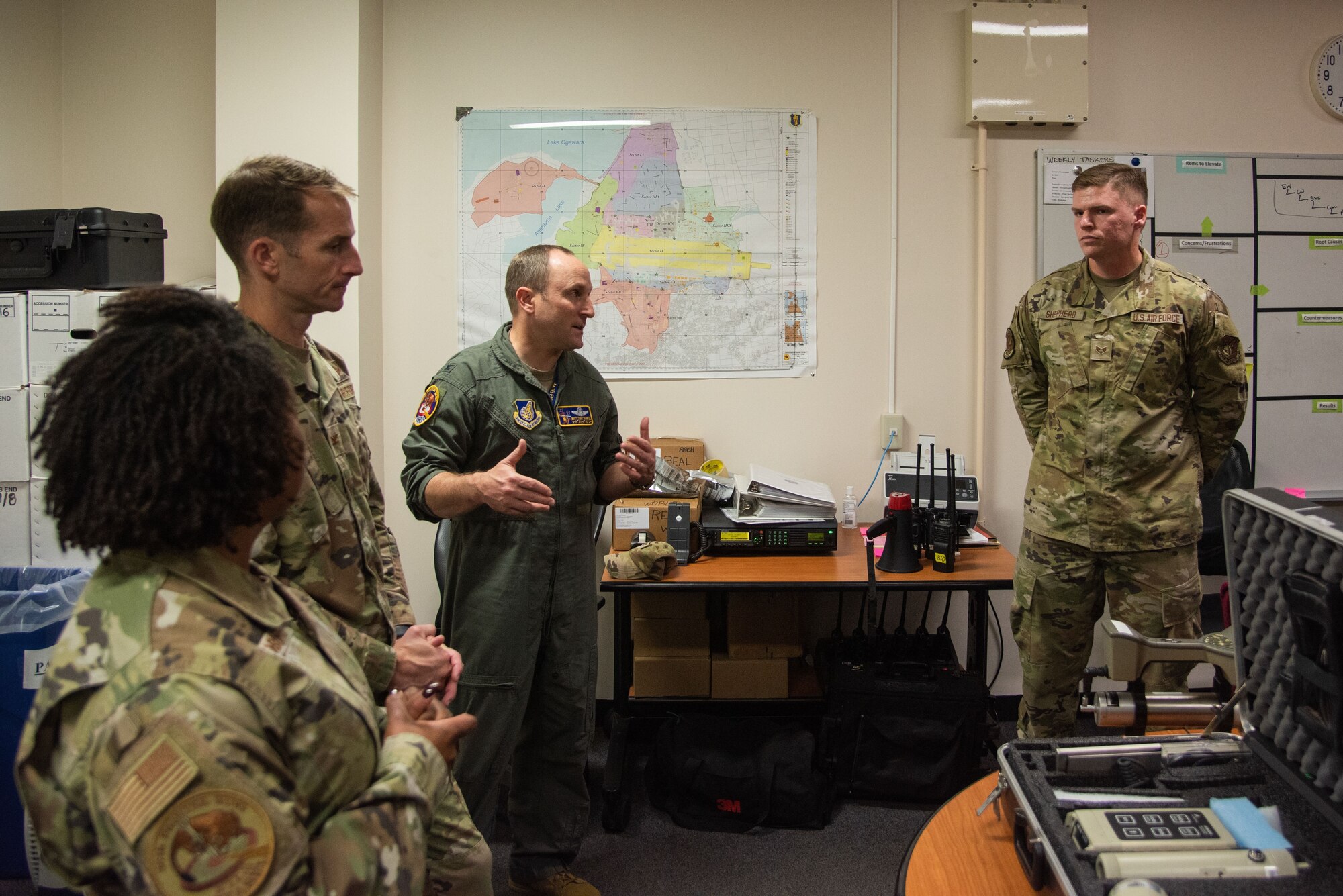35th Fighter Wing Leadership discuss with operations Airmen during Wild Weasel Walk-Through at Misawa Air Base, Oct. 19, 2023.