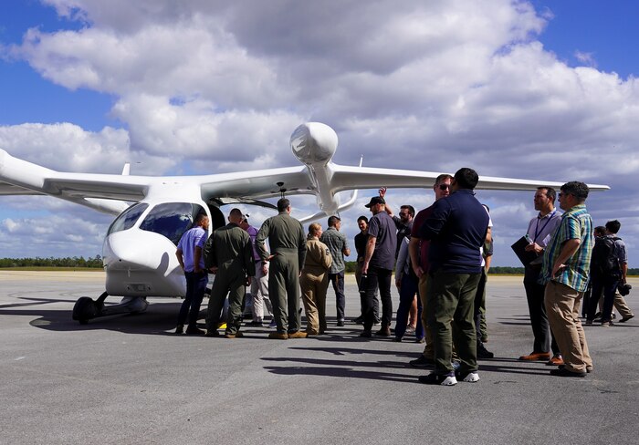 AFWERX Airmen and several local media outlets gathered at Duke Field on Eglin Air Force Base, Florida, to witness the delivery of BETA's ALIA electric aircraft to the Air Force for testing Oct. 26, 2023.
