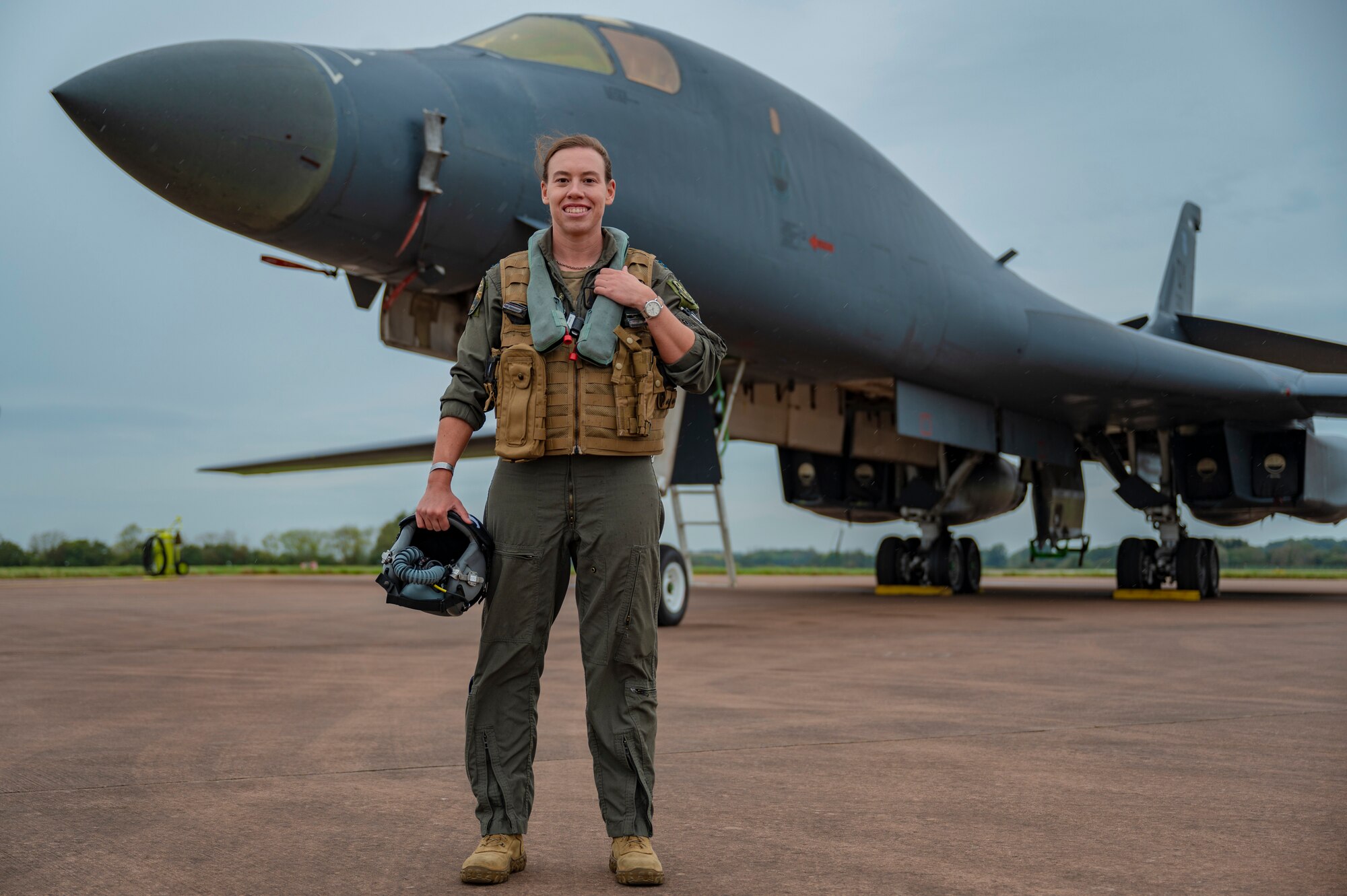 Capt. Simone Durham, 9th Expeditionary Bomb Squadron B-1B Lancer pilot, poses for a photo in front of a B-1B at RAF Fairford, United Kingdom, Oct. 18, 2023. Durham has found a stronger connection to her service in the Air Force through her family legacy during BTF 24-1. (U.S. Air Force photo by Airman 1st Class Emma Anderson)