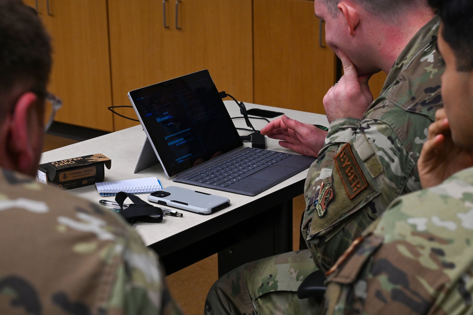 Dyess Airmen attempt a brute force access into a server during the Hackathon event on Dyess Air Force Base, Texas, Oct. 26, 2023. The event taught Airmen from various trades new skills in computer science that may not have been available to them in their career field. (U.S. Air Force photo by Senior Airman Sophia Robello)