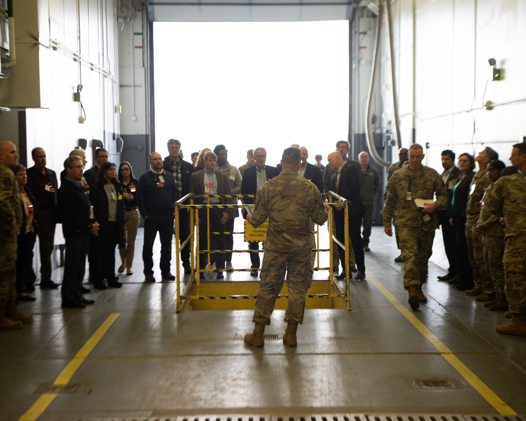 U.S. Air Force Maj. Gen. Jason Armagost, Eighth Air Force and Joint-Global Strike Operations Center commander, Chief Master Sgt. Melvina Smith, Command Chief Master Sergeant, Air Force Global Strike Command and Air Forces Strategic-Air, and directors from the National Laboratory receive a tour of the 705th Munitions Squadron weapons warehouse at Minot Air Force Base, North Dakota, Oct. 18, 2023. During this visit, Armagost, Smith, and the directors toured 5th Bomb Wing and 91st Missile Wing facilities in order to learn how their efforts line up with Team Minot’s contribution to the nuclear triad. (U.S. Air Force photo by Senior Airman Caleb S. Kimmell)