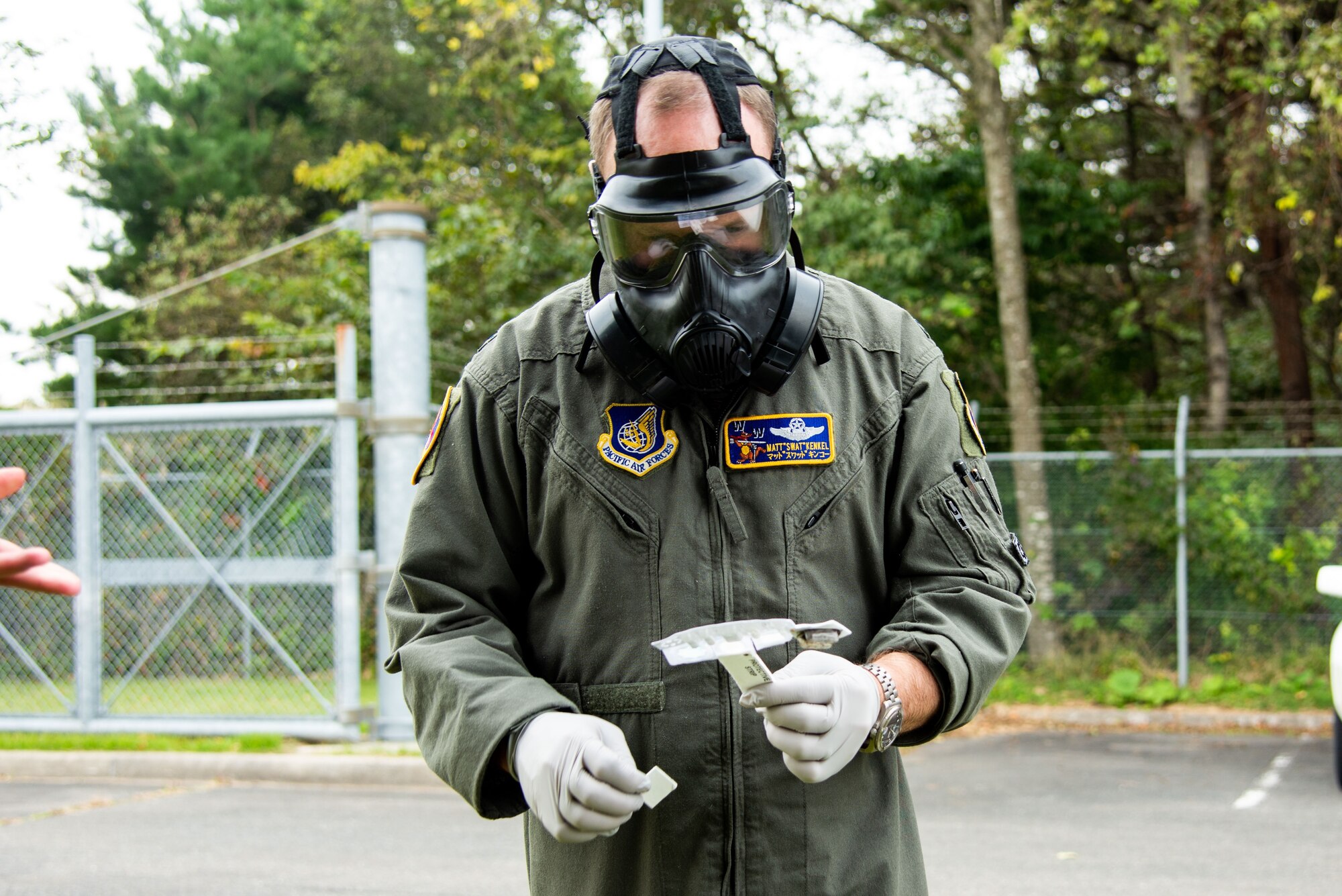 U.S. Air Force Col. Matthew Kenkel, 35th Fighter Wing deputy commander holds a M256 kit during a Wild Weasel Walk-Through at Misawa Air Base, Japan, Oct. 19, 2023.