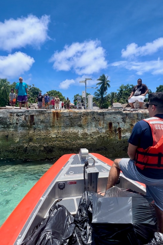 The USCGC Oliver Henry (WPC 1140) crew deliver supplies to Kapingiamarangi, an atoll in the Federated States of Micronesia, on Sept. 25, 2023. The team returned to homeport on Oct. 15 after a 28-day patrol that reinforced the U.S. commitment to sovereignty and resource security in the Federated States of Micronesia Exclusive Economic Zone (EEZ) and beyond. The mission, which was part of Operation Rematau and the broader U.S. Coast Guard's Operation Blue Pacific, fortifies the U.S. reputation as a reliable, trusted partner in the region. (U.S. Coast Guard photo by Petty Officer 2nd Class Breandan Muldowney)