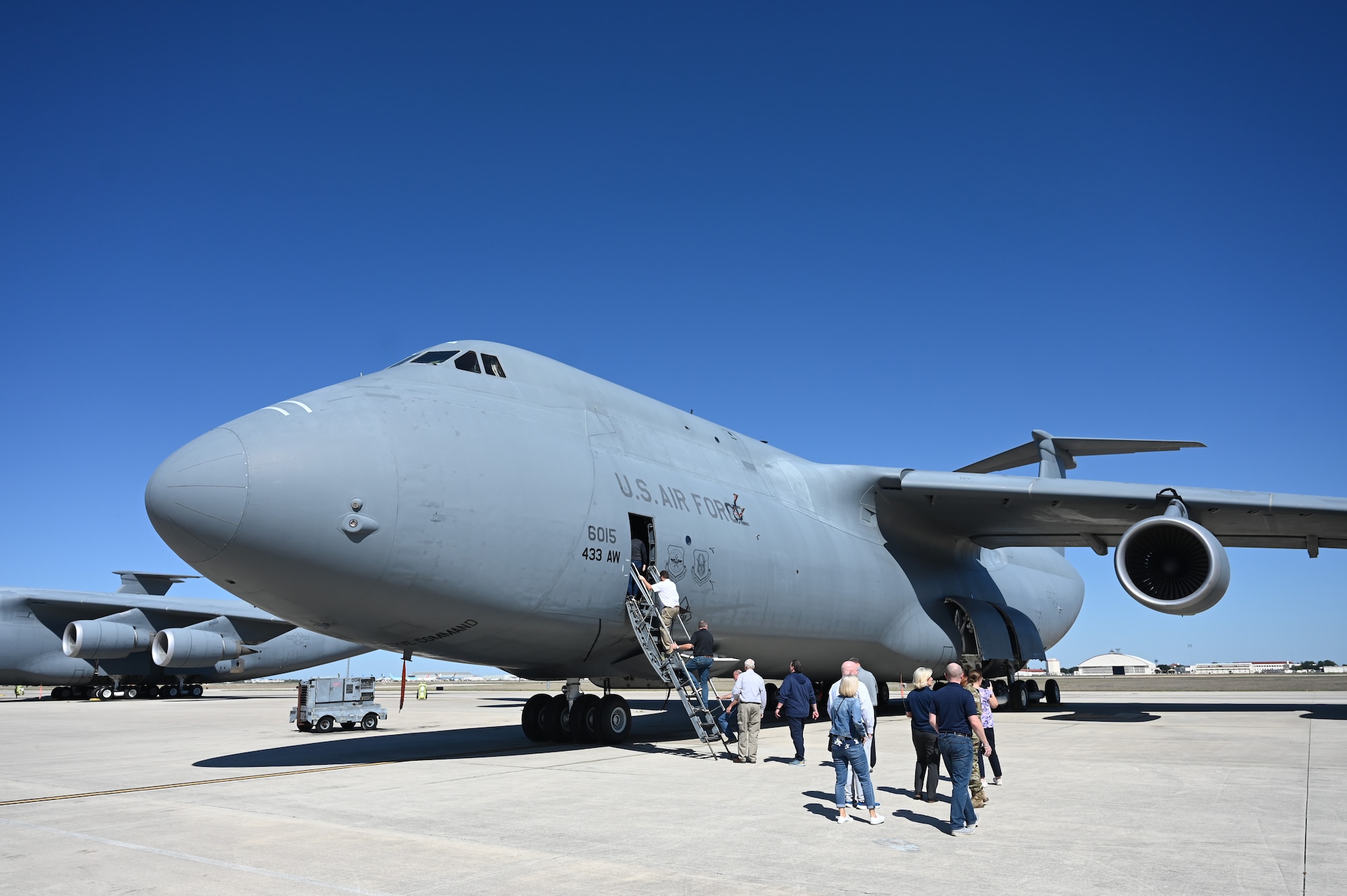 Twenty-two Dayton, Ohio civic leaders tour a 433rd Airlift Wing C-5 Galaxy aircraft while at Joint Base San Antonio-Lackland, Texas, Oct. 19, 2023. The 445th Airlift Wing hosted the group in conjunction with the 433rd AW at Joint Base San Antonio-Lackland, Texas, Oct. 18-19 at Wright-Patterson Air Force Base, Ohio and San Antonio. (U.S. Air Force photo/Master Sgt. Patrick O’Reilly)