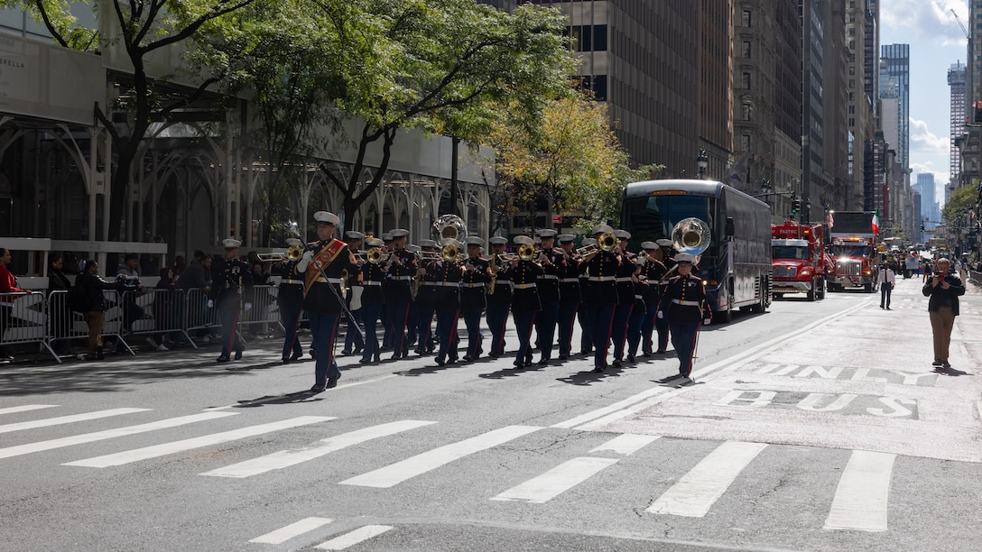U.S. Marines with the 2nd Marine Aircraft Wing (MAW) Band perform during the 79th Annual Columbus Day Parade at Manhattan, New York, Oct. 9, 2023. Marines with the 2nd MAW Band performed during the 79th Annual Columbus Day Parade to strengthen community relationships and reaffirm history, customs, and traditions representative of the United States Marine Corps to those in attendance. 2nd MAW is the aviation combat element of II Marine Expeditionary Force. (U.S. Marine Corps photo by Lance Cpl. Orlanys Diaz Figueroa)