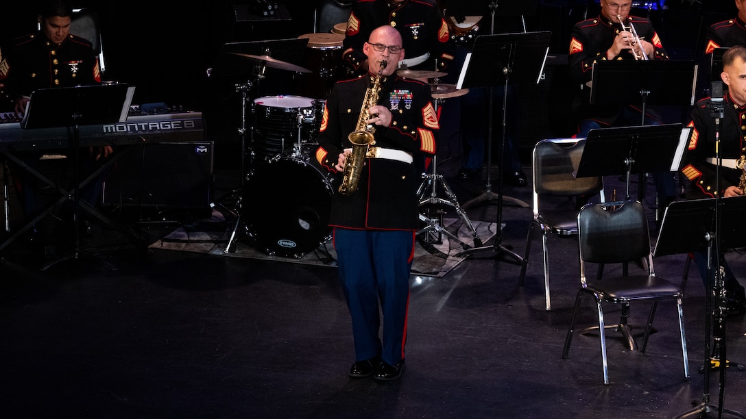U.S. Marine Corps Gunnery Sgt. Michael Newell, a small-ensemble leader with the 2nd Marine Aircraft Wing (MAW) Band, plays the saxophone during the 34th Annual Vincent Vizzo Columbus Day Concert at Bridgeport, Connecticut, Oct. 6, 2023. Marines with the 2nd MAW Band performed during the 34th Annual Vincent Vizzo Columbus Day Concert to strengthen community relationships and reaffirm history, customs, and traditions representative of the United States Marine Corps to those in attendance. 2nd MAW is the aviation combat element of II Marine Expeditionary Force. (U.S. Marine Corps photo by Lance Cpl. Orlanys Diaz Figueroa)