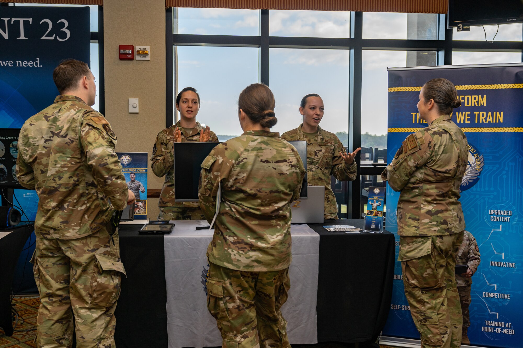 Attendees of the Technical Training 101 visit Tech Expo booths at Keesler Air Force Base, Oct. 25, 2023.