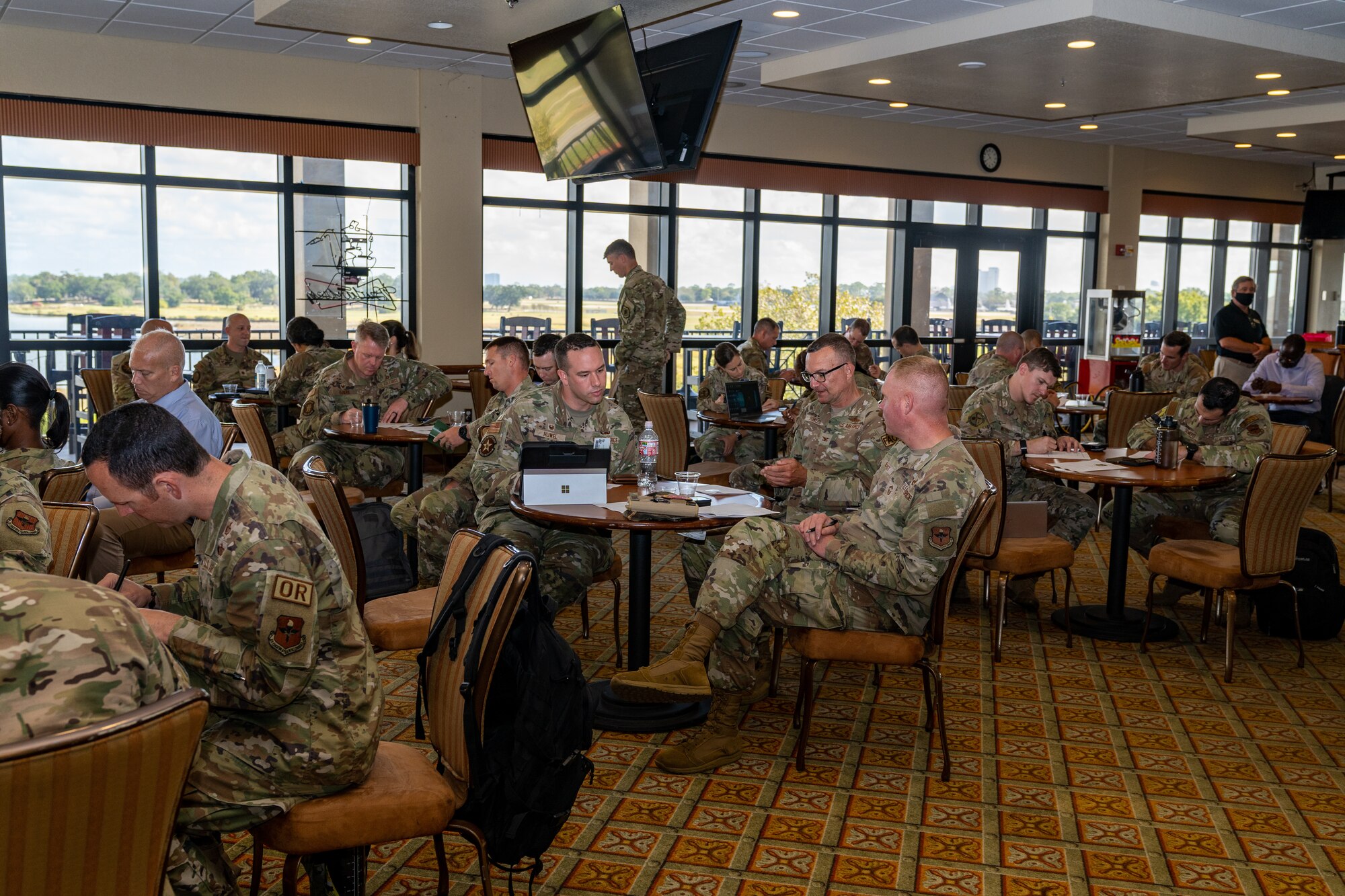 Attendees from Technical Training 101 finalize their group projects at Keesler Air Force Base, Oct. 27, 2023.