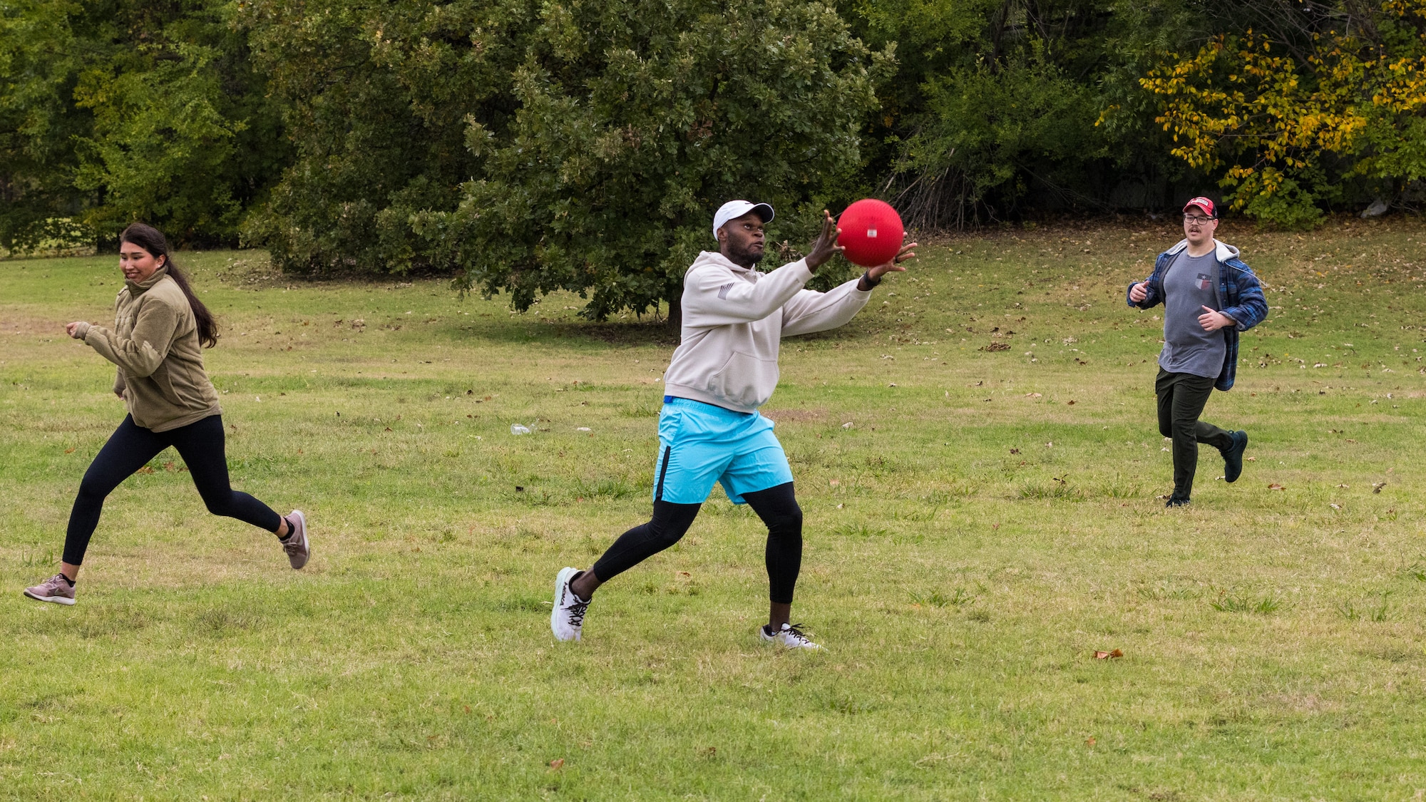 airmen playing kickball