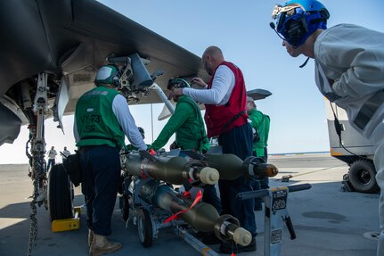 VX-23 and British navy sailors F-35B Lightning II flight training aboard HMS Prince of Wales (R09) in the Atlantic Ocean.