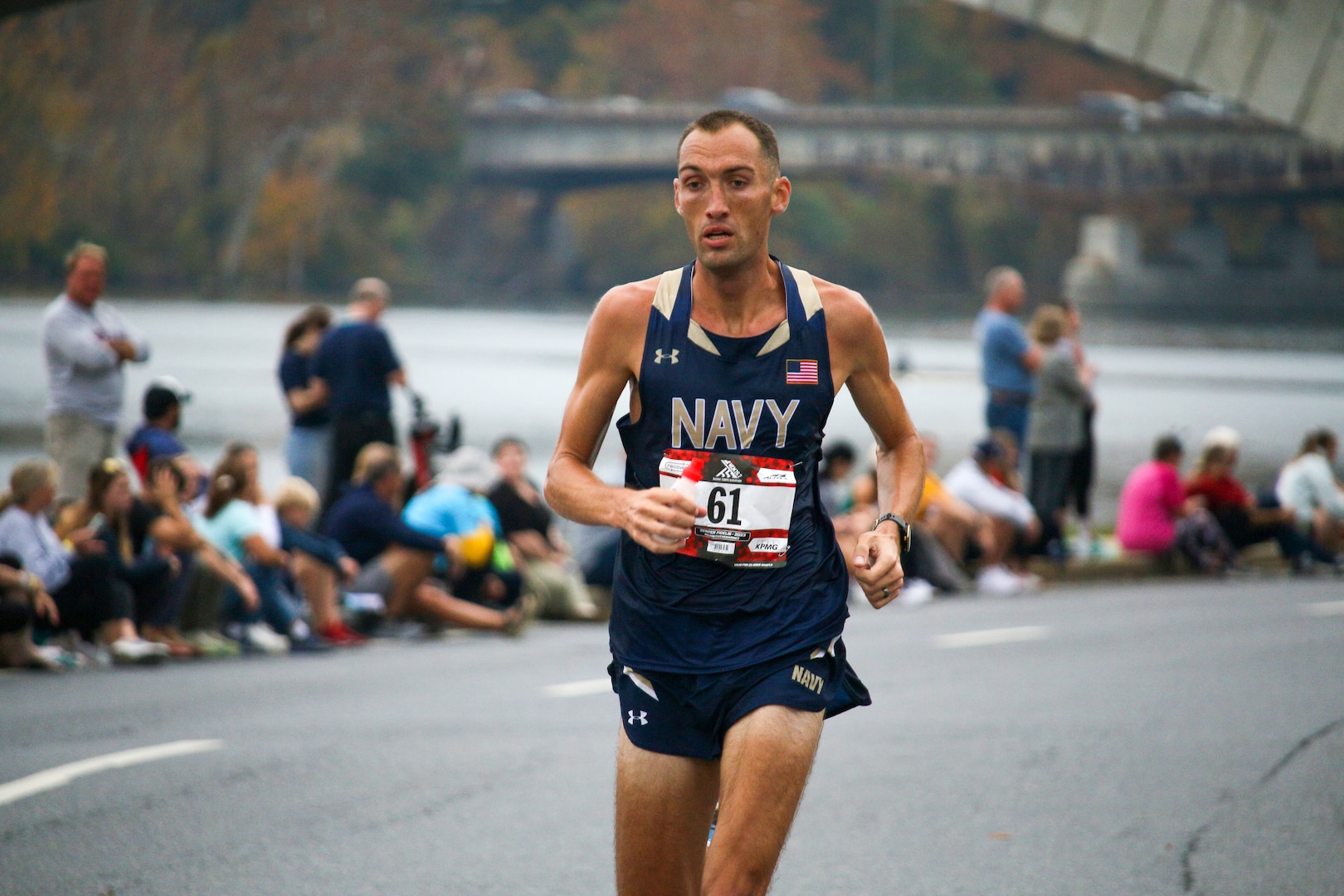 Navy Lt. Cmdr Patrick Hearn of Pearl Harbor Naval Shipyard, Hawaii on his way to men's gold to win the men's division of the 2023 Armed Forces Marathon Championship held in conjunction with the 48th Marine Corps Marathon in Washington, D.C.  The Armed Forces Championship features teams from the Army, Marine Corps, Navy (with Coast Guard runners), and Air Force (with Space Force Runners).  Department of Defense Photo by Mr. Steven Dinote - Released.