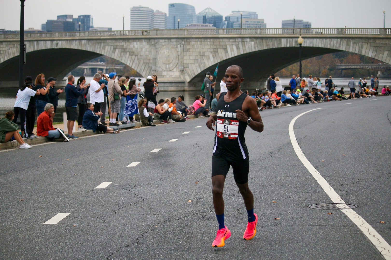 Army Capt. Samson Mutua of Fort Bliss, Texas on his way to men's bronze during the 2023 Armed Forces Marathon Championship held in conjunction with the 48th Marine Corps Marathon in Washington, D.C.  The Armed Forces Championship features teams from the Army, Marine Corps, Navy (with Coast Guard runners), and Air Force (with Space Force Runners).  Department of Defense Photo by Mr. Steven Dinote - Released.