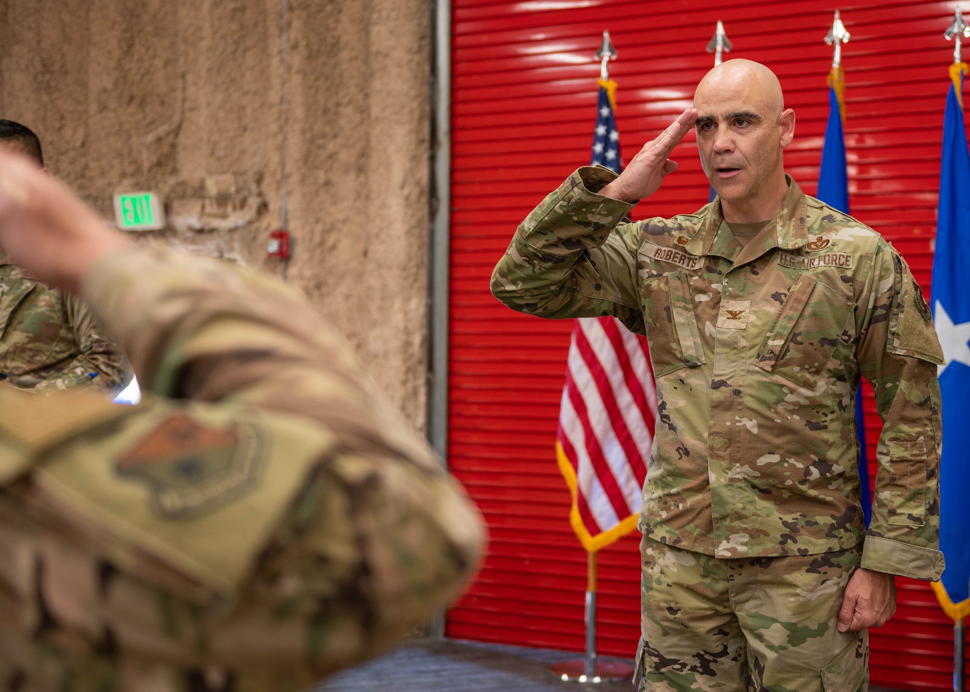U.S. Air Force Col. Adam Roberts, commander of the 356th Expeditionary Civil Engineer Group, renders his first salute at the Pacific Regional Training Center - Andersen, Guam, on Andersen Air Force Base, Guam, Oct. 20, 2023. Roberts is now responsible for leading the 356th ECEG. (U.S. Air Force photo by Airman Allon Lapaix)
