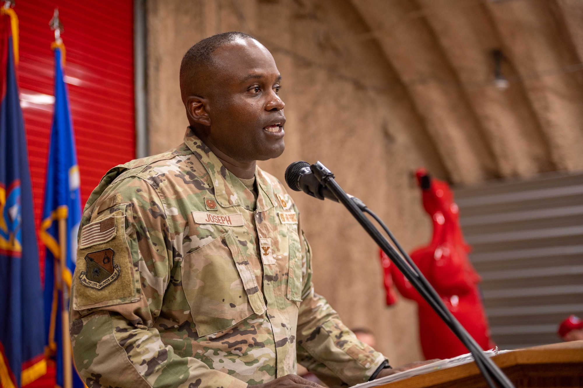 U.S. Air Force Col. Kenneth Joseph, commander of the 356th Expeditionary Civil Engineer Group, gives his remarks during the 513th Rapid Engineer Deployable Heavy Operations Repair Squadron Engineers Squadron assumption of command ceremony at the Pacific Regional Training Center – Andersen, Guam, Oct. 20, 2023.  Maj. Chrystopher Nicholson assumed command of the 513th RHS. (U.S. Air Force photo by Airman Allon Lapaix)