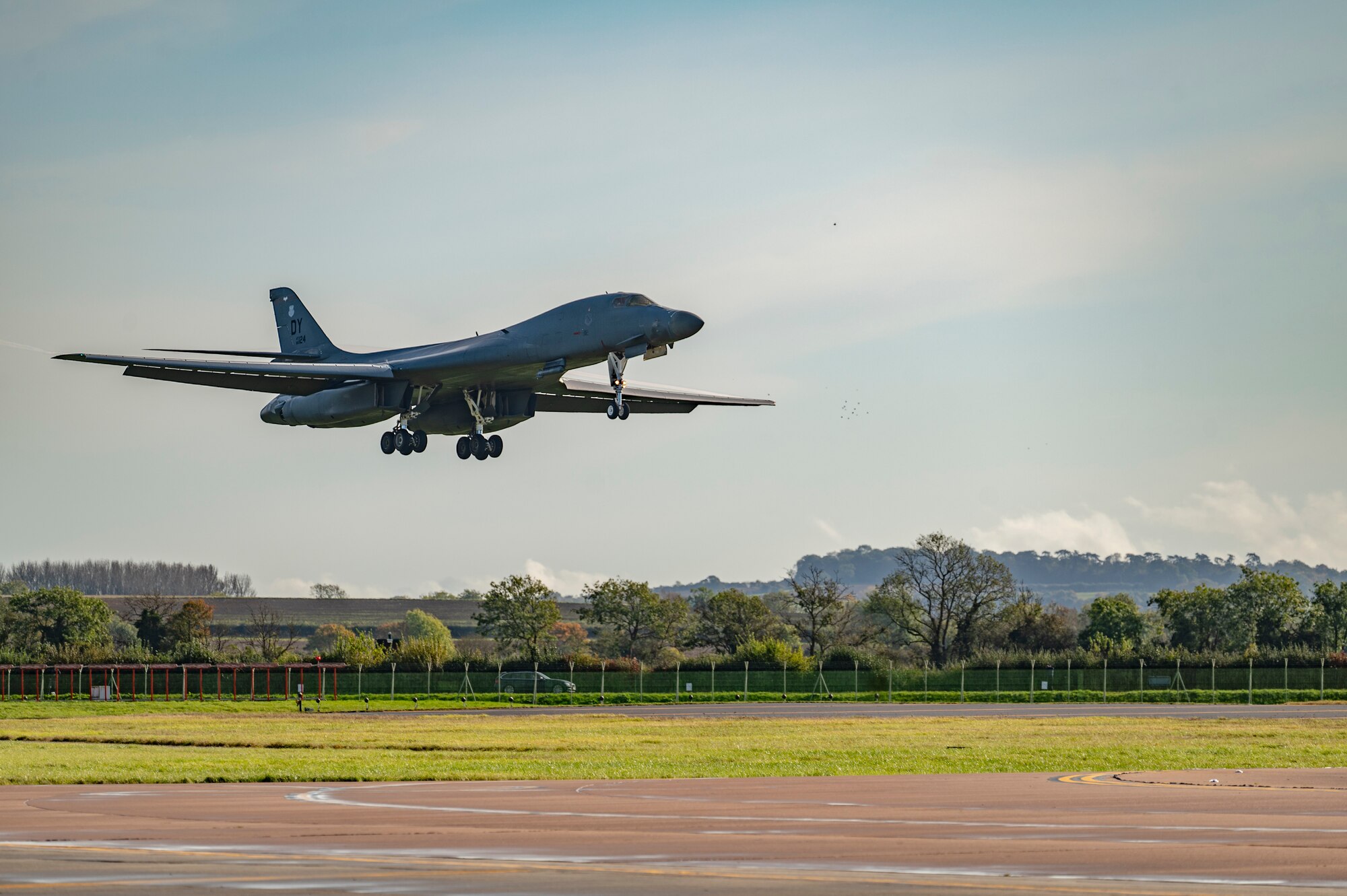 A B-1B Lancer assigned to the 9th Expeditionary Bomb Squadron prepares to land at RAF Fairford, United Kingdom, Oct. 27, 2023. Hot pit refueling capabilities showcase innovation and mission readiness by allowing the aircraft to refuel without stopping their engines. (U.S. Air Force photo by Airman 1st Class Emma Anderson)