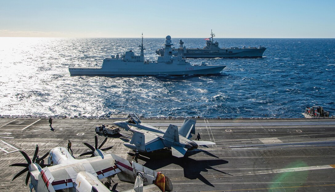 Italian navy anti-submarine frigate ITS Carlo Margottini and command and control ship USS Mount Whitney transit alongside USS Harry S. Truman in support of Neptune Strike 22, February 2, 2022, in Adriatic Sea