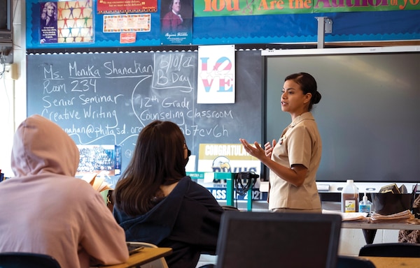 Navy Lieutenant Mayra Perez, Tours With Industry fellow, speaks to George Washington High School students during Navy Promotional Day in Philadelphia, Pennsylvania, May 11, 2022 (U.S. Navy/Diana Quinlan)