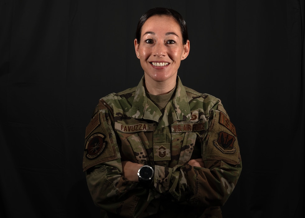 U.S. Air Force Senior Master Sgt. Nicole Favuzza, 70th Operations Support Squadron senior enlisted leader, poses for a photo Oct. 27, 2023, at Fort George G. Meade, Maryland. Representing Team U.S. during the Invictus Games Düsseldorf 2023, Germany, Favuzza competed in track, field, cycling, swimming, and indoor rowing events, earning two gold, silver, and bronze medals each. The games welcomed around 500 competitors from 21 nations and believes in empowering individuals to reclaim their sense of purpose, identity, and future, transcending the boundaries of their injuries. (U.S. Air Force photo by Tech. Sgt. Kevin Iinuma)