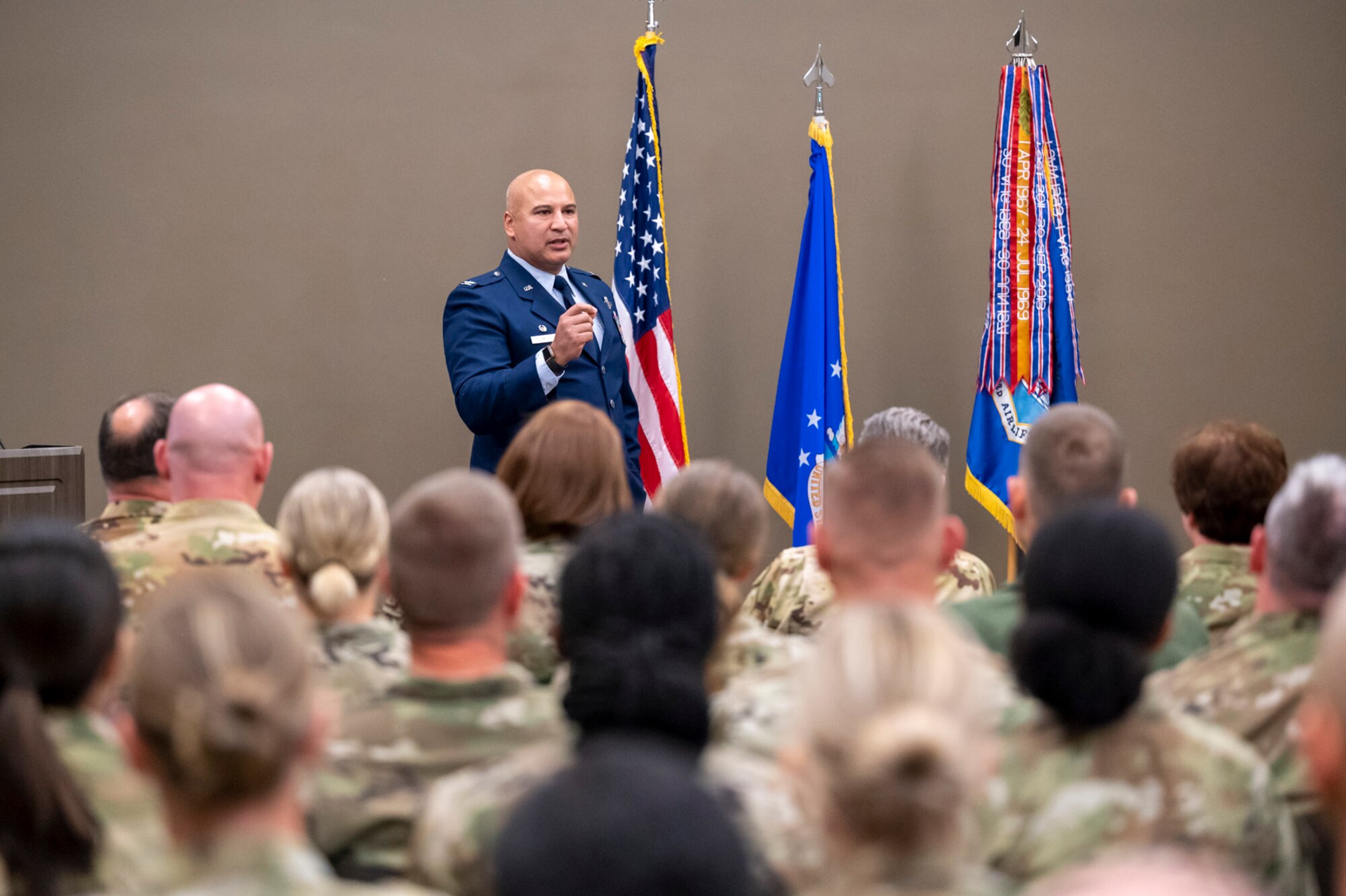 Col. Jeffrey Smith, 932nd Airlift Wing commander, speaks to the audience during Col. Dori Mansur's Assumption of Command ceremony as she takes command of the 932nd Mission Support Group, Oct. 14th, 2023, Scott Air Force Base, Illinois. (U.S. Air Force photo by Senior Airman Jonathan Stefanko)