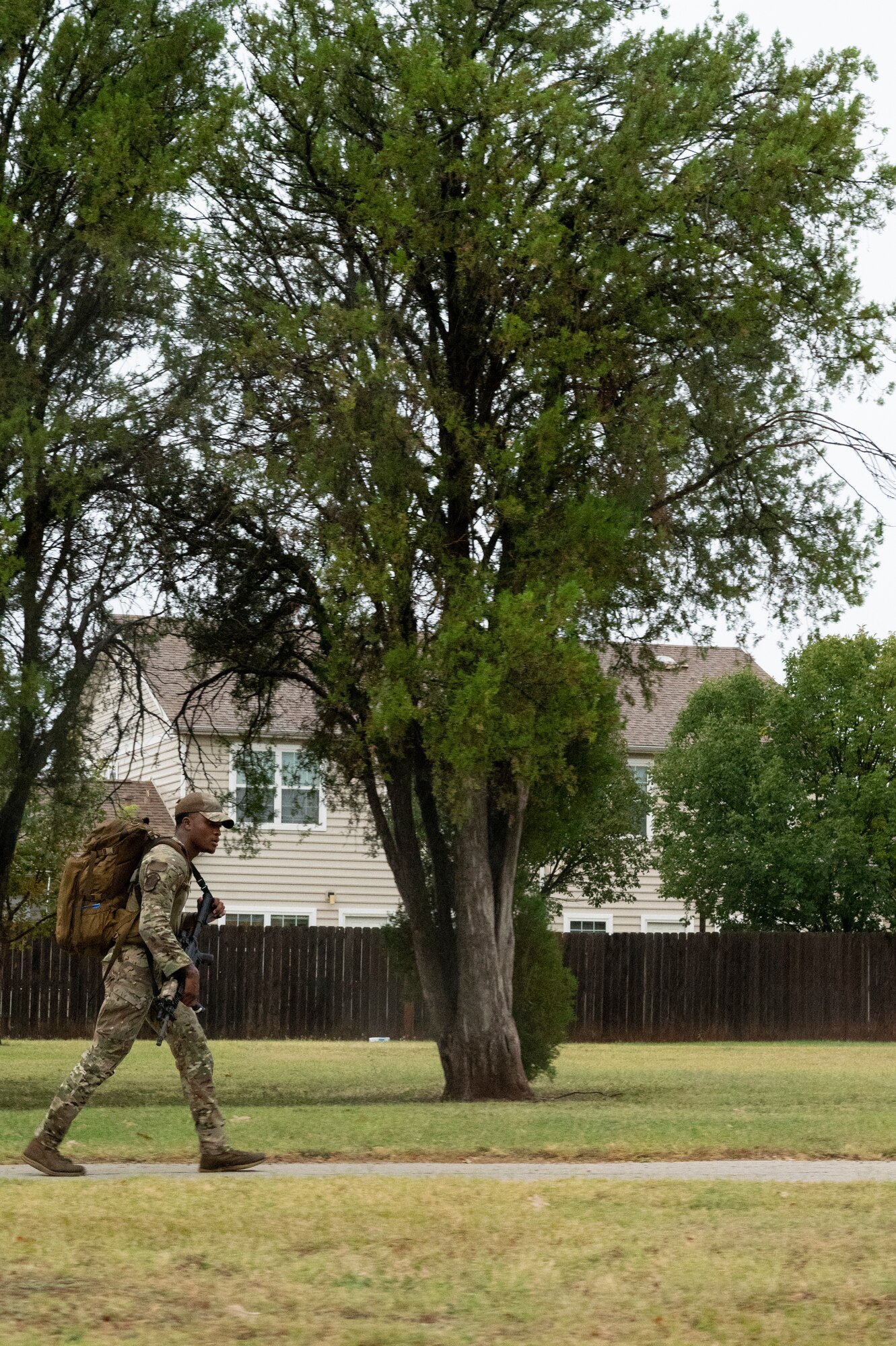 U.S. Air Force Airman 1st Class Elijah Pogue, 7th Security Forces Squadron defender, rucks 7 miles during the Expert Defender competition at Dyess Air Force Base, Texas, Oct. 25, 2023. Defenders rucked with a minimum of 35 pounds dry weight in under two hours to demonstrate their combat capabilities. (U.S. Air Force photo by Airman 1st Class Alondra Cristobal Hernandez)