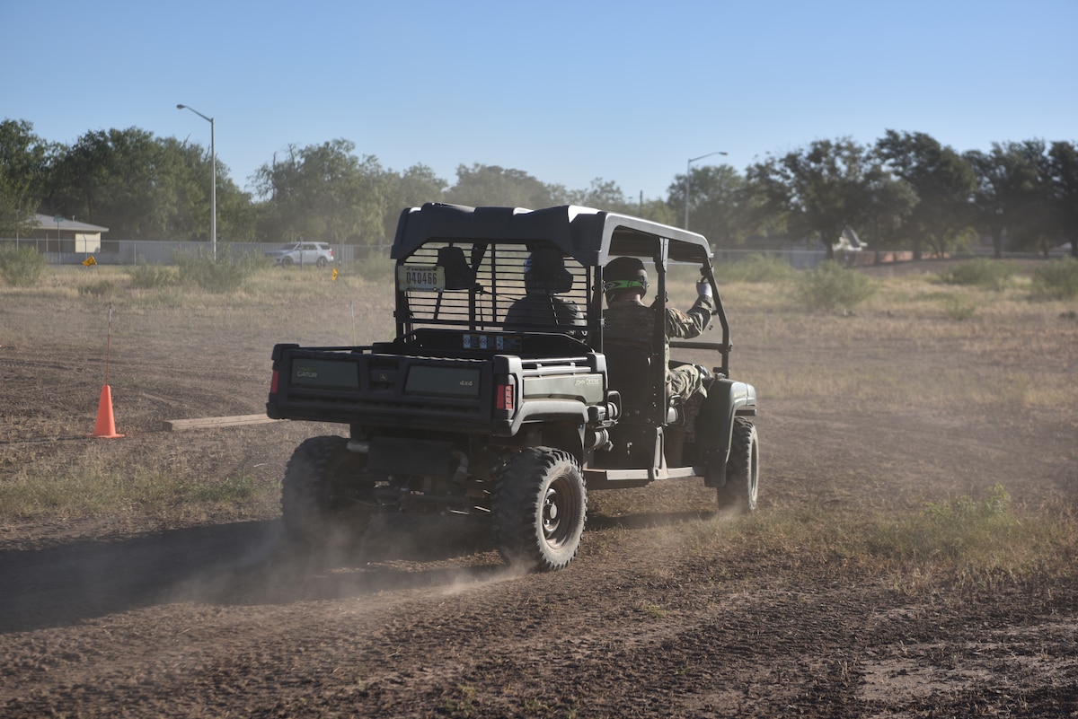 A John Deere Gator XUV 825M S4, a utility terrain vehicle, is utilized for the Recreational Off-Highway Vehicle Association course practical exercise, Goodfellow Air Force Base, Texas, Oct. 17, 2023. The ROHVA course equips personnel with the expertise and skills needed to effectively use ROHVs to support their missions.(U.S. Air Force photo by Airman James Salellas)