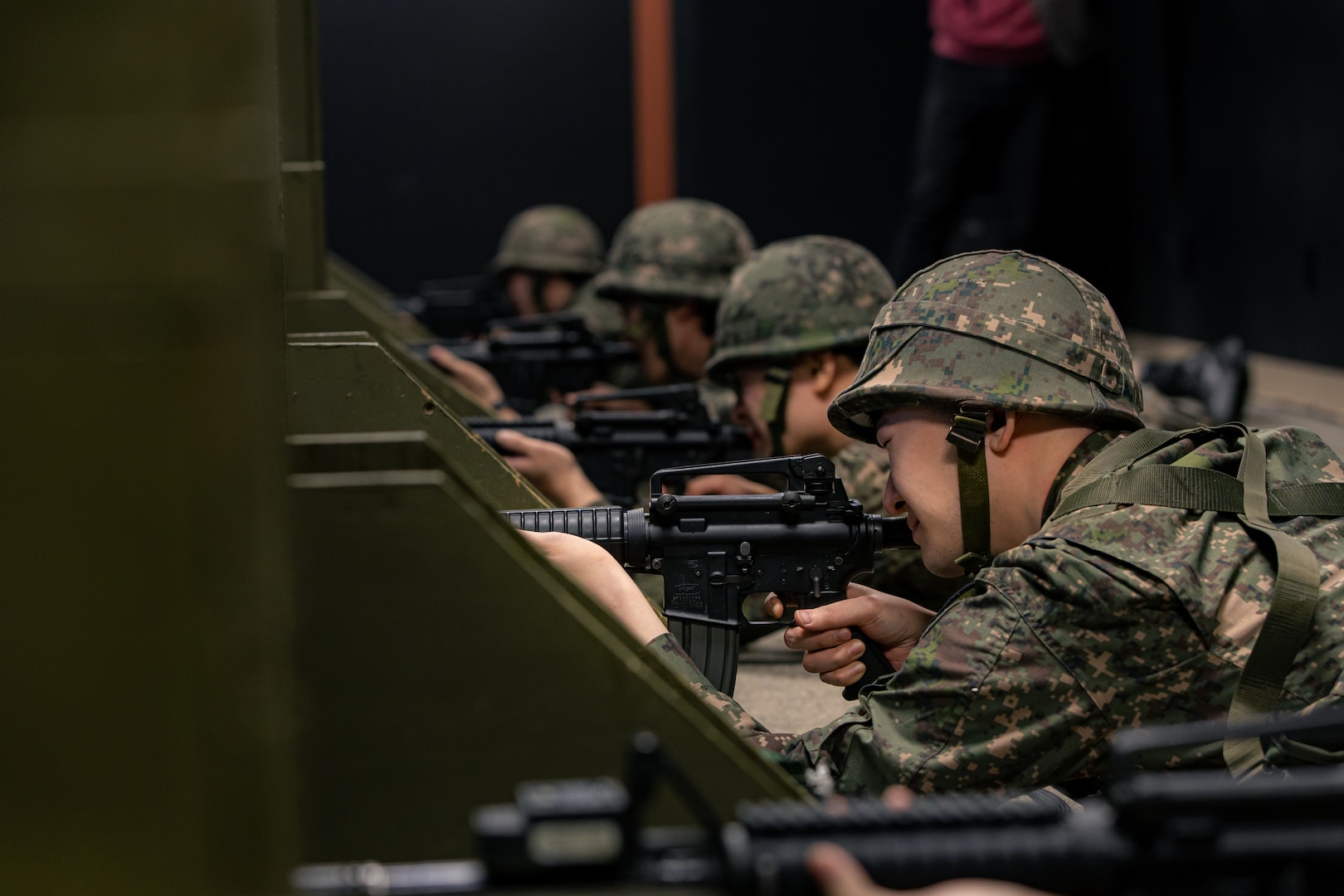 Korean Augmentation to the U.S. Army reserve Soldiers conduct basic rifle marksmanship training on a simulator on U.S. Army Garrison Humphreys, South Korea, Oct. 25, 2023. These KATUSA Soldiers have completed their mandatory service obligation to the Republic of Korea Army, but must undergo periodic refresher training on their wartime mission. (U.S. Army photo by Cpl. Choi, Kang Min)