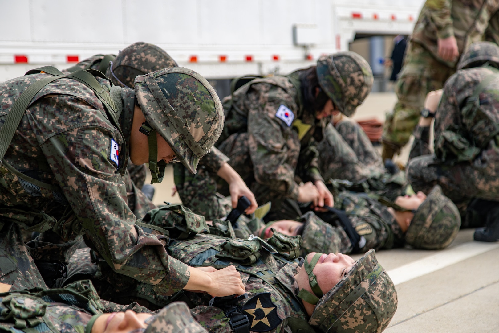 Korean Augmentation to the U.S. Army reserve Soldiers conduct first aid training on U.S. Army Garrison Humphreys, South Korea, Oct. 25, 2023. These KATUSA Soldiers have completed their mandatory service obligation to the Republic of Korea Army, but must undergo periodic refresher training on their wartime mission. (U.S. Army photo by Cpl. Choi, Kang Min)