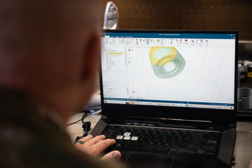 U.S. Air Force Tech. Sgt. Christopher Tolley, explosive ordnance disposal technician from the 87th Civil Engineer Squadron, creates a 3D model of a training ordnance to be printed within their facility on Joint Base McGuire-Dix-Lakehurst, N.J., Oct. 10, 2023. The 87th CES/EOD implemented 3D printed training ordnance to rapidly adapt to new threats entering the battle space and more accurately simulate activation feedback from the device.