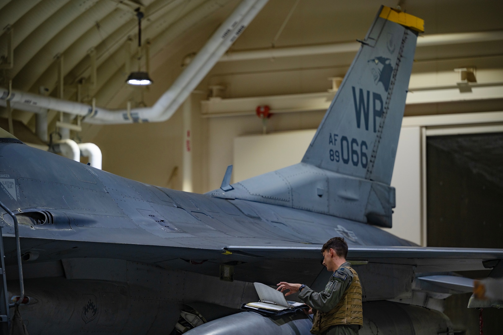 Capt. Jacob Yarnell reviews preflight procedures during Vigilant Defense.