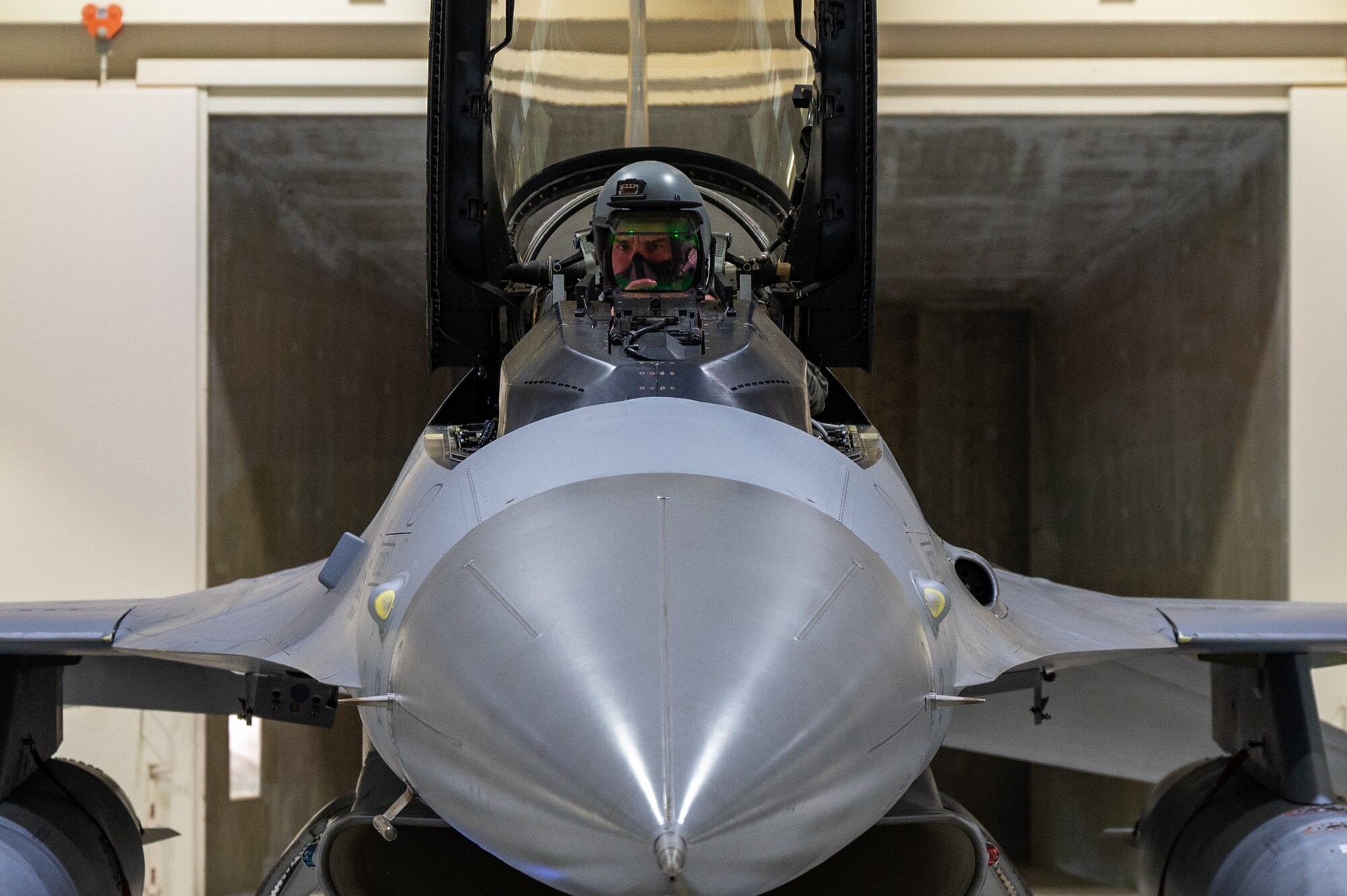 Capt. Patrick Oshea onducts a preflight systems check during Vigilant Defense.